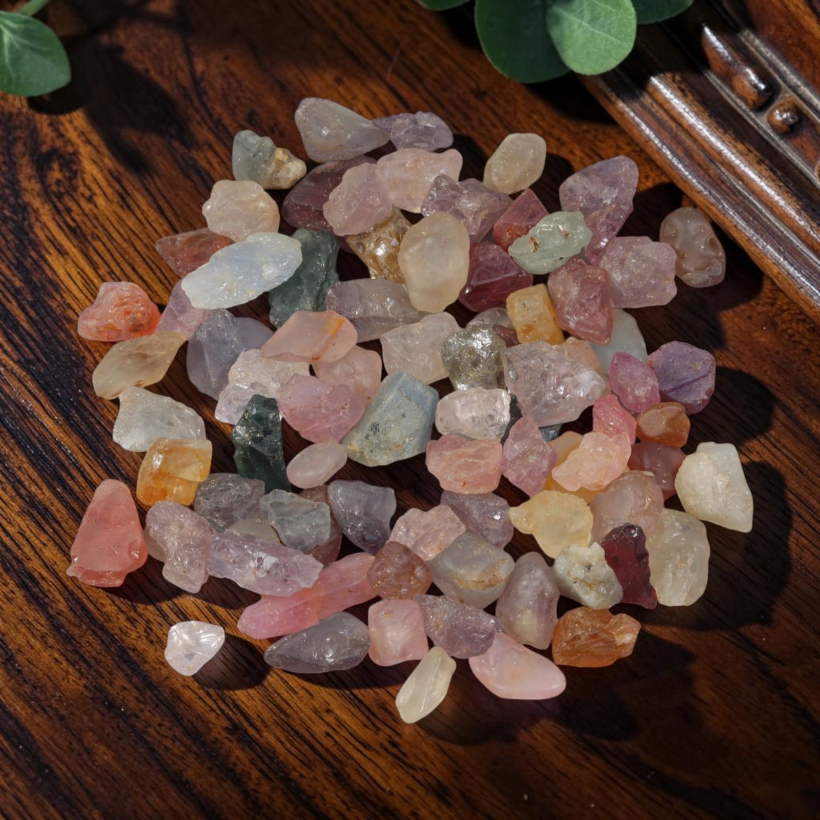 128.84 Carats Natural Multicolor Spinel Rough Parcel, 80YH: This assorted parcel of natural multicolor spinel rough showcases a diverse range of blush pink, lavender, pale golden yellow, soft orange, muted green, and translucent neutral tones characteristic of
