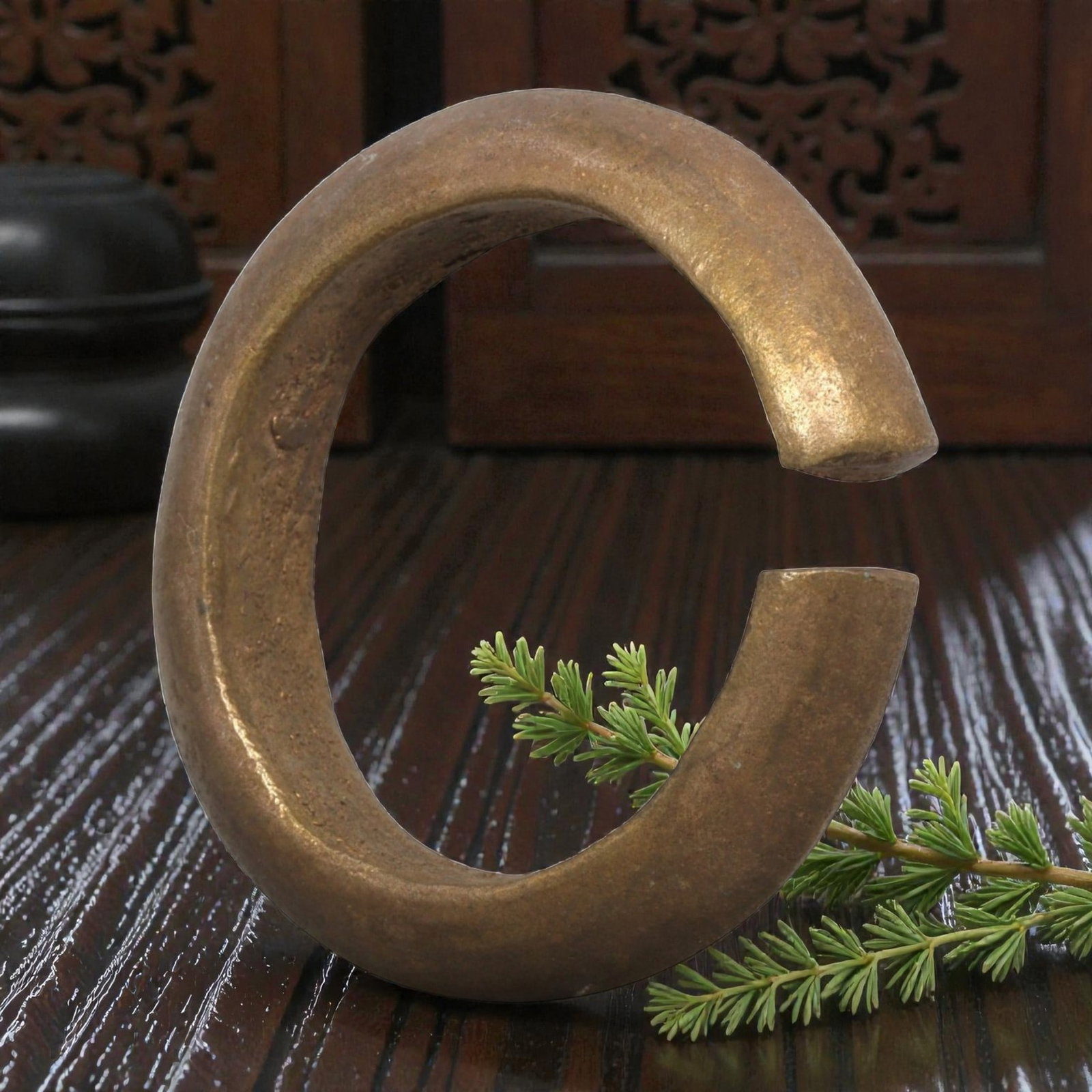 Ancient Roman Bronze Bracelet - Thick Open Cuff, 66BN: Crafted from bronze, this open bracelet features a thick, robust C-shaped form with a narrow gap between flat, undecorated terminals. The surface retains a smooth, warm metallic patina with minimal ox