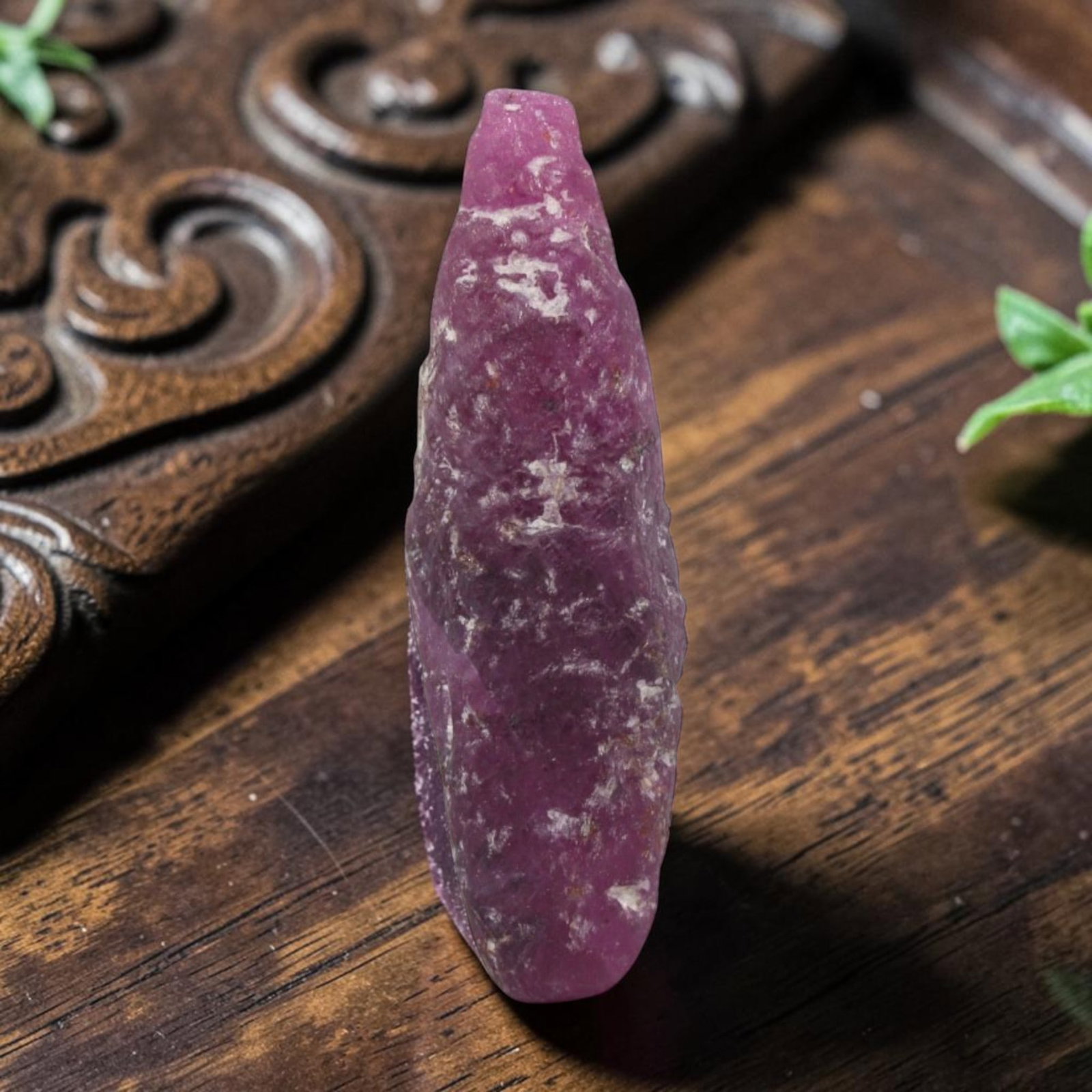 6.93ct Natural Mauritania Ruby Rough (Unheated), 60XE: This unheated Mauritania ruby rough is a captivating natural crystal specimen, featuring vivid magenta-purple ruby formations embedded in a contrasting greyish matrix. The stone's rugged, unpolished s