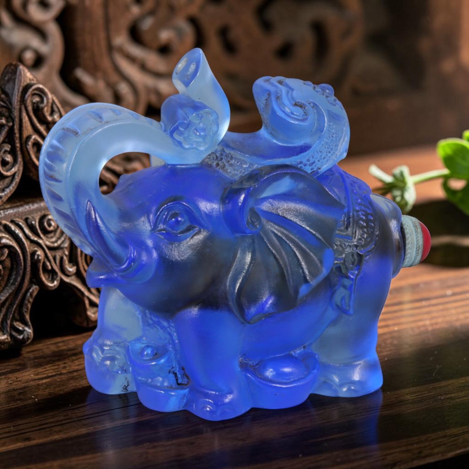 Vintage Chinese Sapphire Blue Liuli Glass Snuff Bottle - Elephant With Ruyi & Ingot, 44AS: This elaborately sculpted figurine snuff bottle is handcrafted from translucent frosted sapphire blue vintage Chinese liuli glass, shaped as a blessed elephant statue rich with traditional auspicious 
