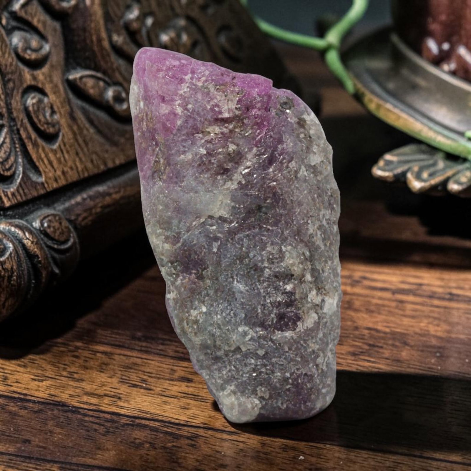 17.46ct Natural Mauritania Ruby Rough (Unheated), 64XE: This unheated Mauritania ruby rough is a captivating natural crystal specimen, featuring vivid magenta-purple ruby formations embedded in a contrasting greyish matrix. The stone's rugged, unpolished s