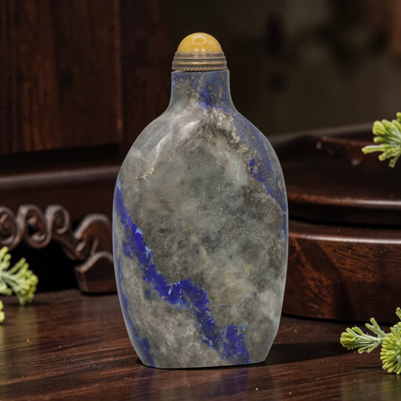 Vintage Chinese Lapis Lazuli Snuff Bottle - Grey Matrix Form, 55YF: Crafted from solid lapis lazuli, this vintage Chinese snuff bottle features a smooth, polished form with a dominant grey matrix. The stone displays striking, vivid blue lapis lazuli veins against a mu