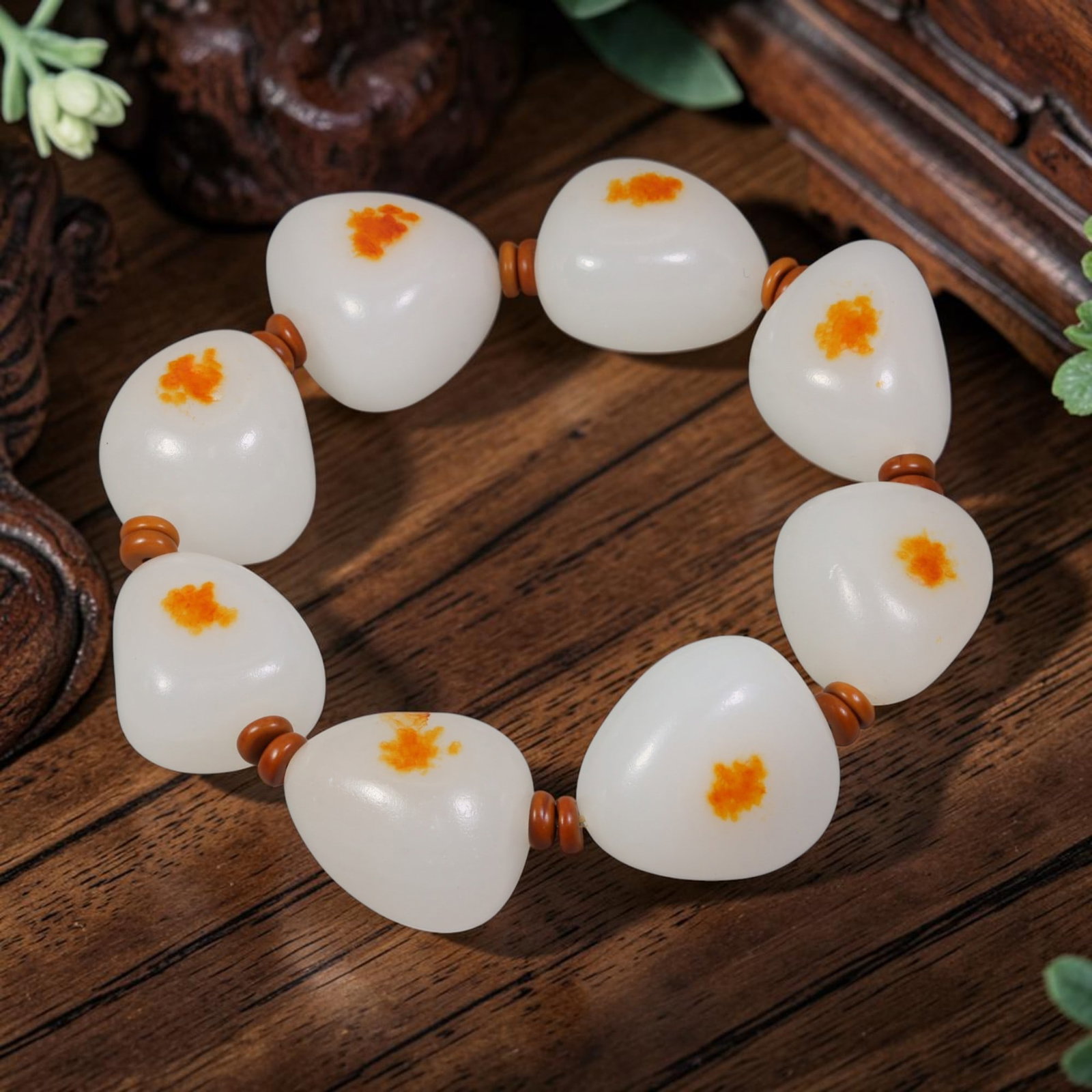 Chinese Hetian Nephrite White Seed Pebble Bracelet - Natural Russet Skin, 51YJ: This bracelet is composed of natural, uncarved Hetian nephrite white seed pebble jade stones, each retaining organic river-worn, rounded teardrop shapes with a soft, milky white base tone. Each stone 