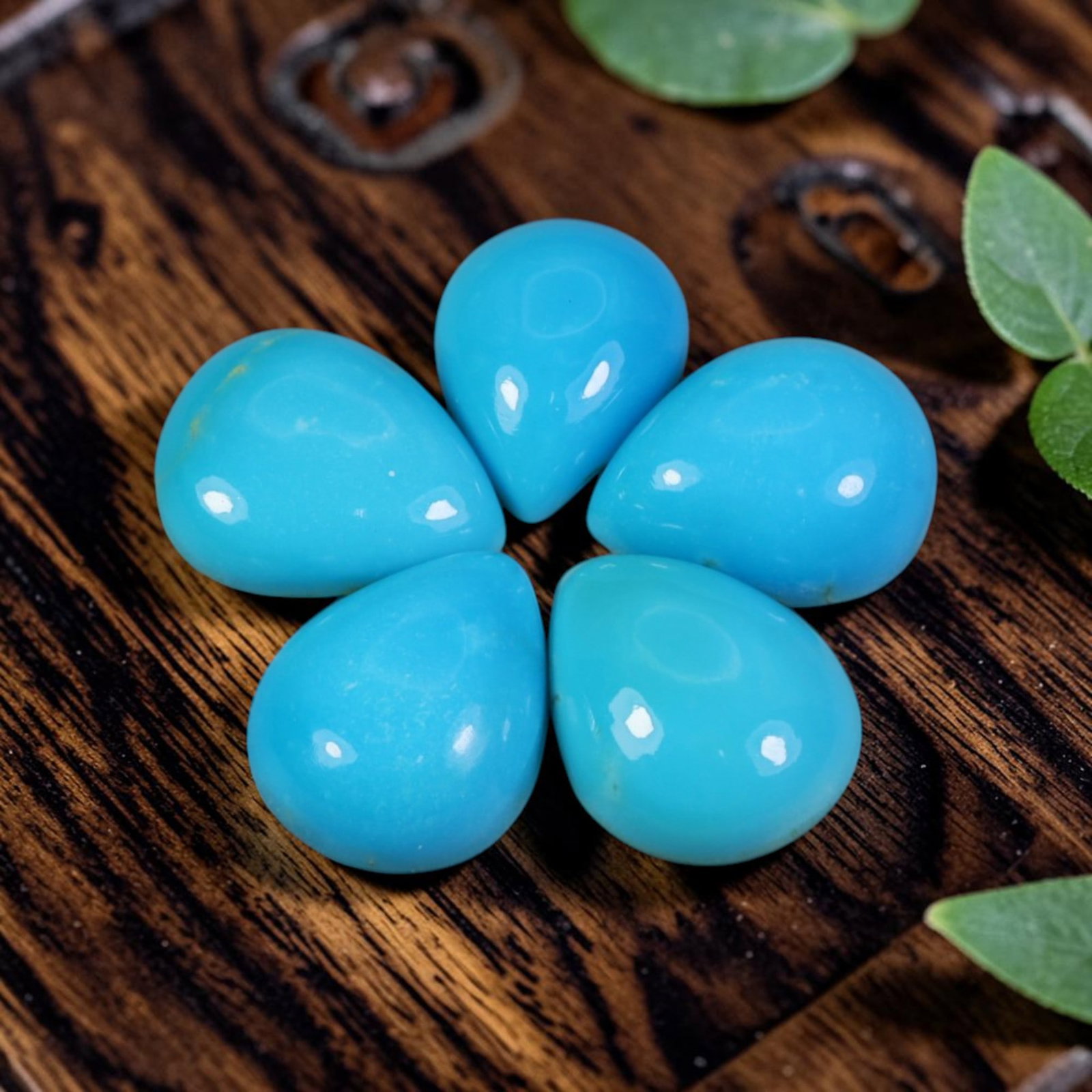 9.51 Carats Natural Arizona Sleeping Beauty Turquoise Pear Cabochon Parcel, 92WC: This parcel consists of polished pear/teardrop cabochons of genuine Arizona Sleeping Beauty Turquoise, featuring the iconic uniform vibrant sky-blue hue highly sought after from this famous mine depos