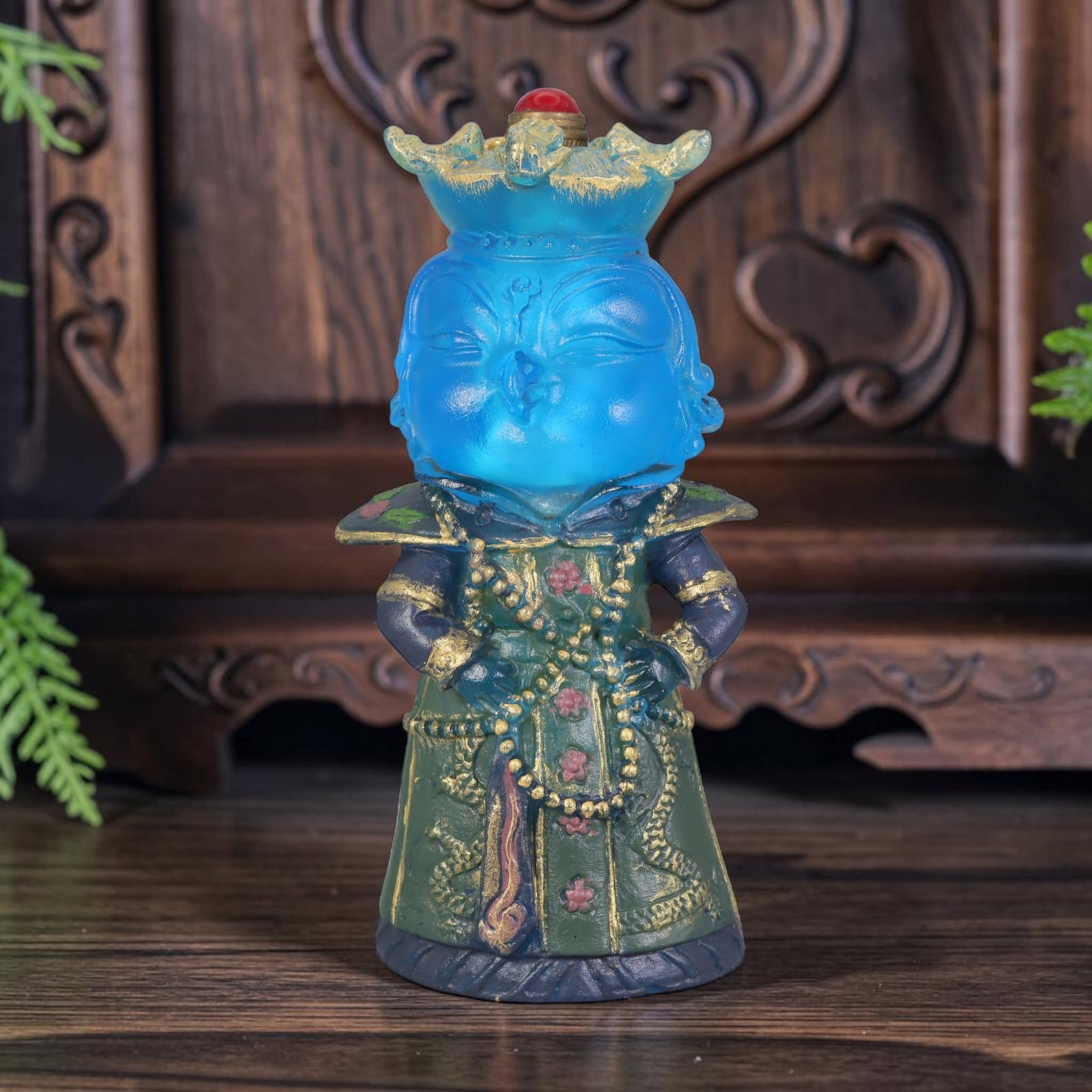 Vintage Chinese Liuli Glass Snuff Bottle - Imperial Queen Figurine, 32AS: This snuff bottle is cast from translucent blue liuli glass and shaped as a standing imperial queen with a gilded crown topped with a red bead stopper. The royal robe is hand-painted with floral patte