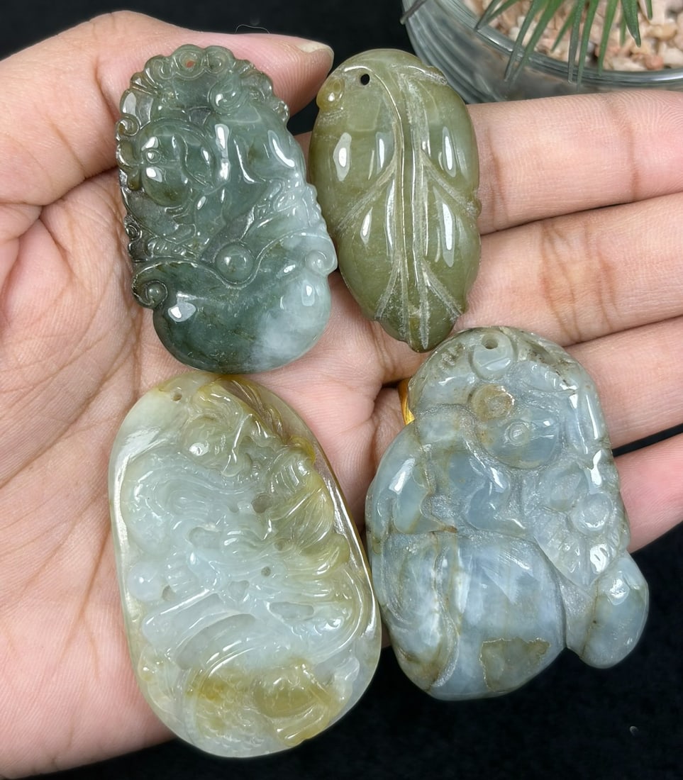 Lot Of 4 Natural Burmese Type A Jadeite Jade Carved Pendants, 90AS: This four-piece collection features individually hand-carved pendants crafted from untreated natural Type A Burmese jadeite jade, adorned with traditional auspicious Chinese motifs including dragon re