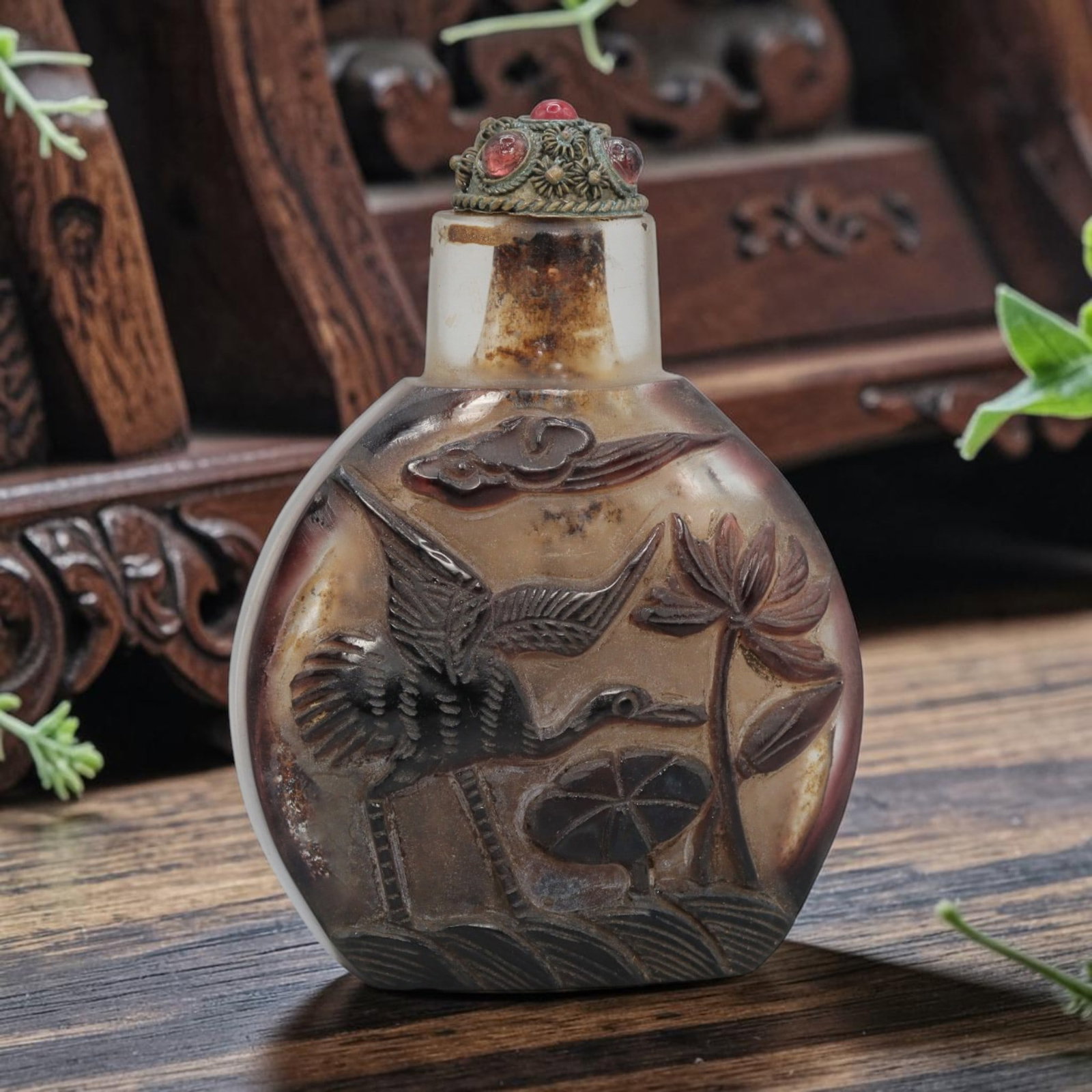 Vintage Chinese Overlay Liuli Snuff Bottle - Crane & Lotus Motif, 73YF: Crafted from frosted translucent glass with dark reddish-brown overlay, this vintage Chinese snuff bottle features two-sided relief carving. One side depicts a single crane in flight beside lotus flow