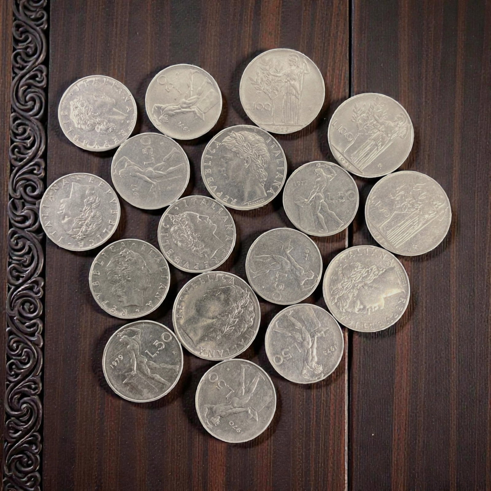 ITALY: Republican Classicism - Lira Bulk Coin Lot, 16V: This bulk lot of Italian Lira coins showcases the elegant, neoclassical design language of the Italian Republic. The obverse features a stylized profile of Italia, framed by "REPUBBLICA ITALIANA," whi