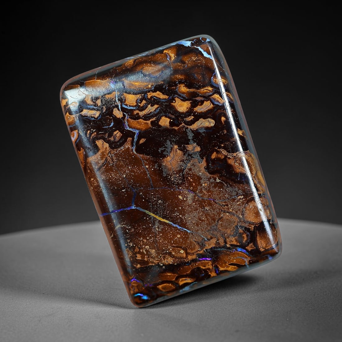 20.21ct Natural Australian Queensland Matrix Boulder Opal Rounded Rectangle Cabochon, 73AV: Hand polished medium-sized rounded rectangular cabochon of natural Queensland matrix boulder opal, featuring rich speckled chocolate ironstone matrix decorated with distinctive layered orbicular golde