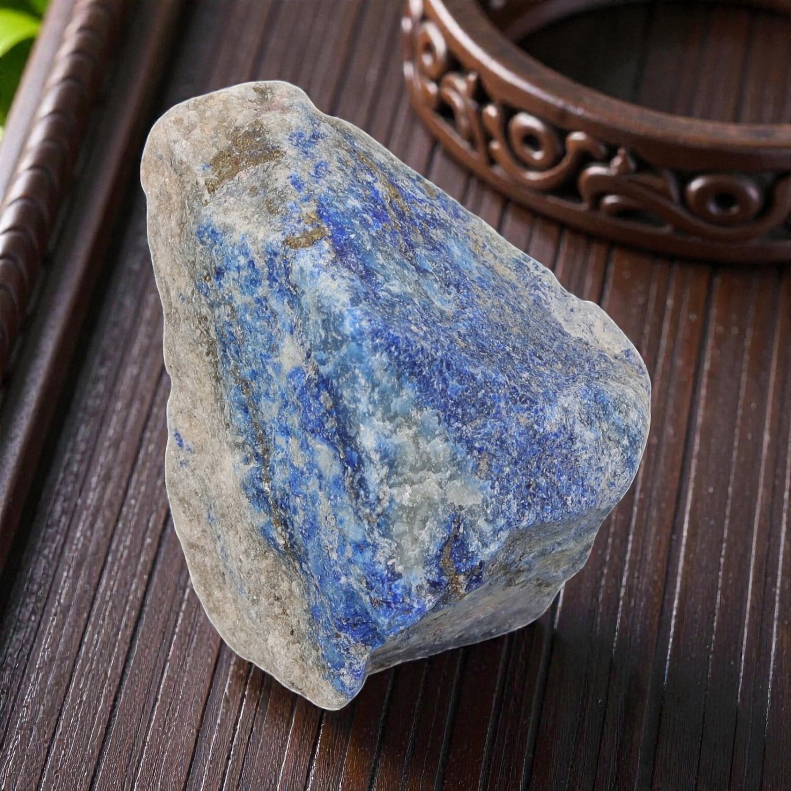 380 carats Natural Lapis Lazuli Rough, 50ZB: This is a natural, unpolished lapis lazuli rough specimen, featuring rich deep blue lazurite formations interspersed with a pale calcite matrix and subtle pyrite inclusions across its surface. The sto