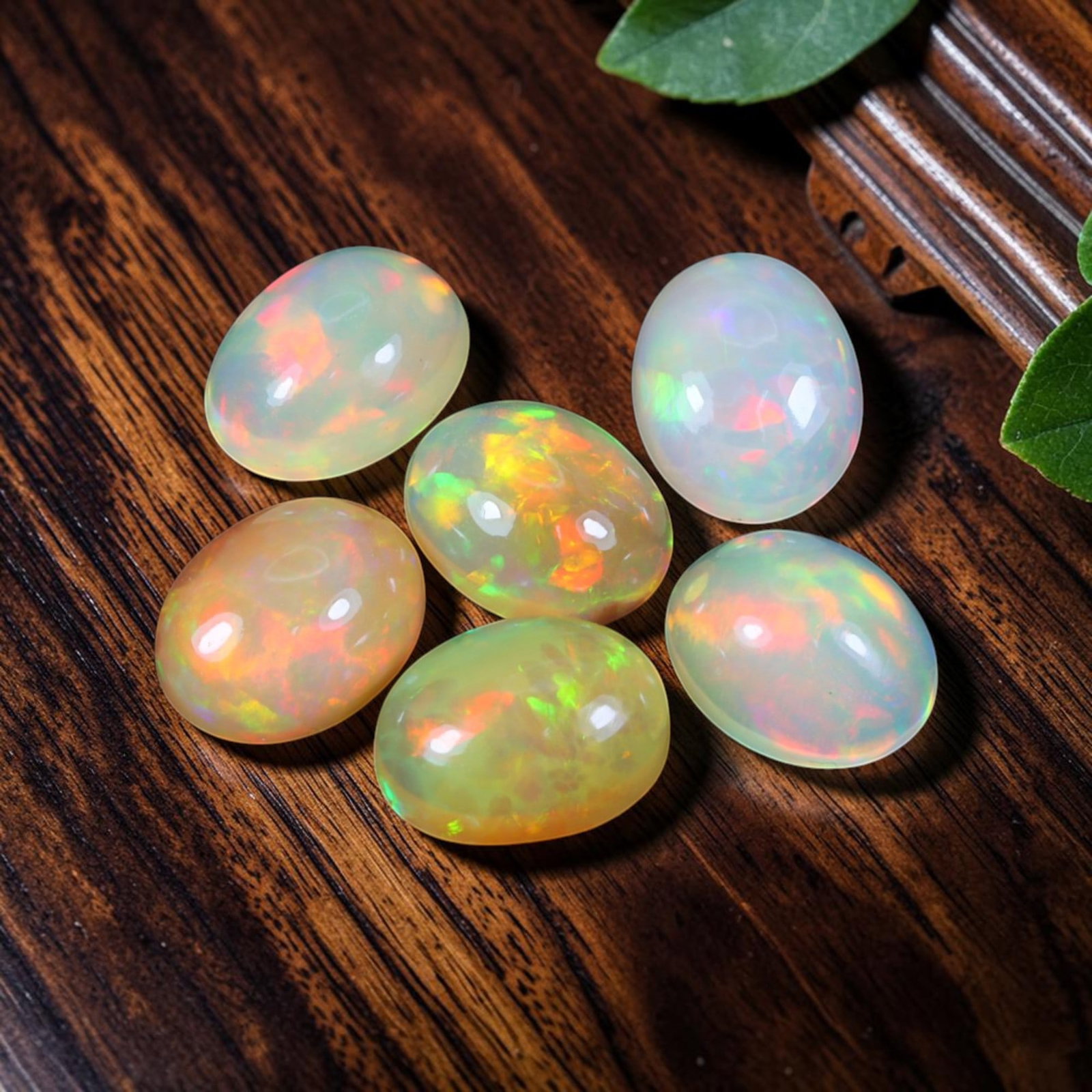 7.62 Carats Natural Ethiopia Welo Opal Oval Cabochon Parcel, 87WC: This parcel contains six polished oval cabochons of authentic natural Ethiopia Welo Opal, originating from the renowned Welo opal deposit in Ethiopia. Each calibrated cabochon measures approximately 9