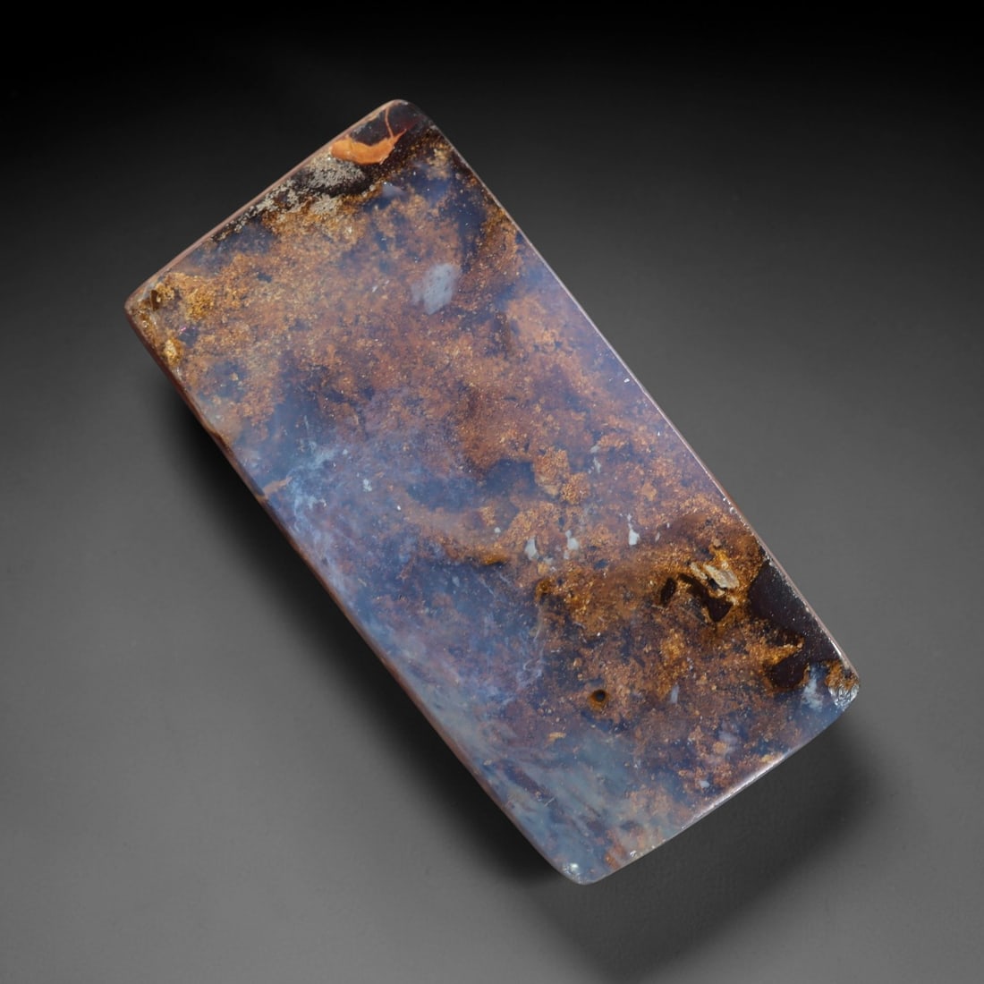 13.52 Carats Soft Blue and Brown Matrix Boulder Opal Cabochon - Natural Australian Stone, 62XM: This substantial boulder opal cabochon features a rectangular form with a translucent, soft blue base infused with delicate iridescent undertones, set against a contrasting matrix of earthy brown and 