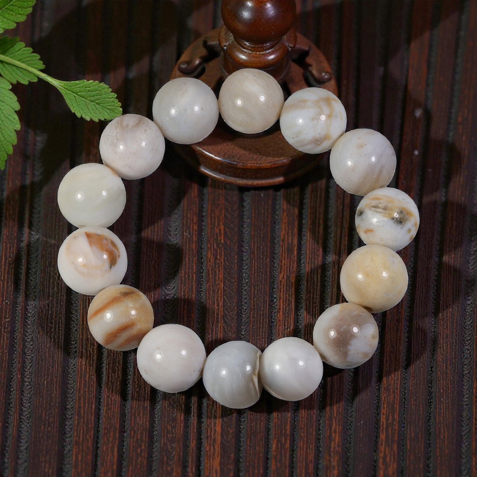 Natural Burmese Fossilized Wood Beaded Bracelet, 2AK: Come take a look at this one-of-a-kind fossilized wood bracelet, a little piece of ancient history you can wear! This bracelet has a comfortable 56mm diameter, strung with smooth, polished round beads