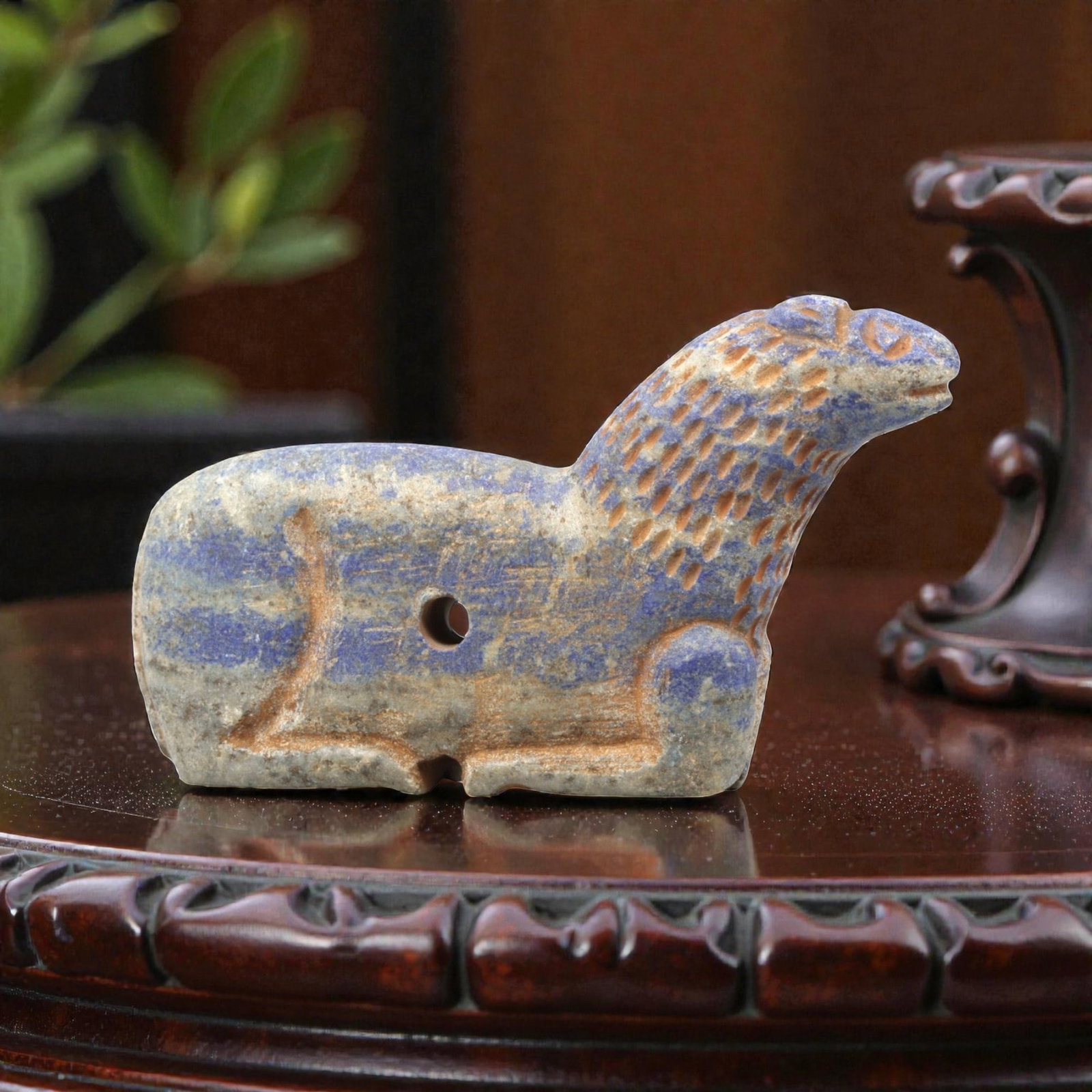 Near Eastern Lapis Lazuli Plaque - Tribal Art Zoomorphic Feline Amulet, 27ZA: Carved from solid lapis lazuli, this Near Eastern tribal art piece is shaped as a stylized zoomorphic feline amulet, executed with detailed tribal craftsmanship. The feline form is rendered in a crouc