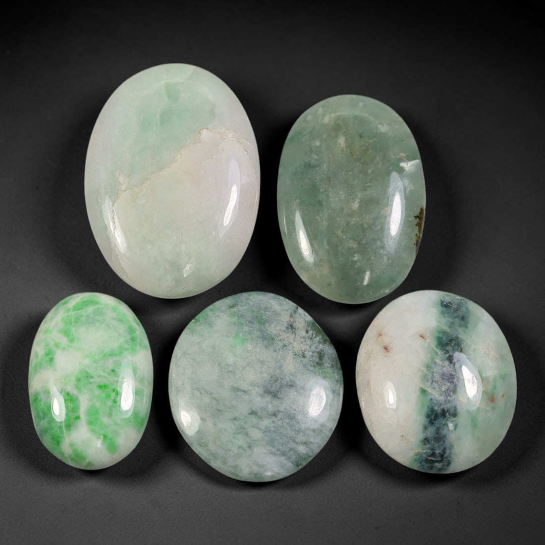 Lot of 5pcs 121ct Natural Burmese Type A Mixed Banded Speckled Pale Ice Jadeite Jade Cabochons, 59AV: This wholesale bulk lot contains 5 fully untreated natural Burmese Type A jadeite jade oval cabochons with a total combined weight of 121ct, largest dimension 31x22mm. Each cabochon features a translu