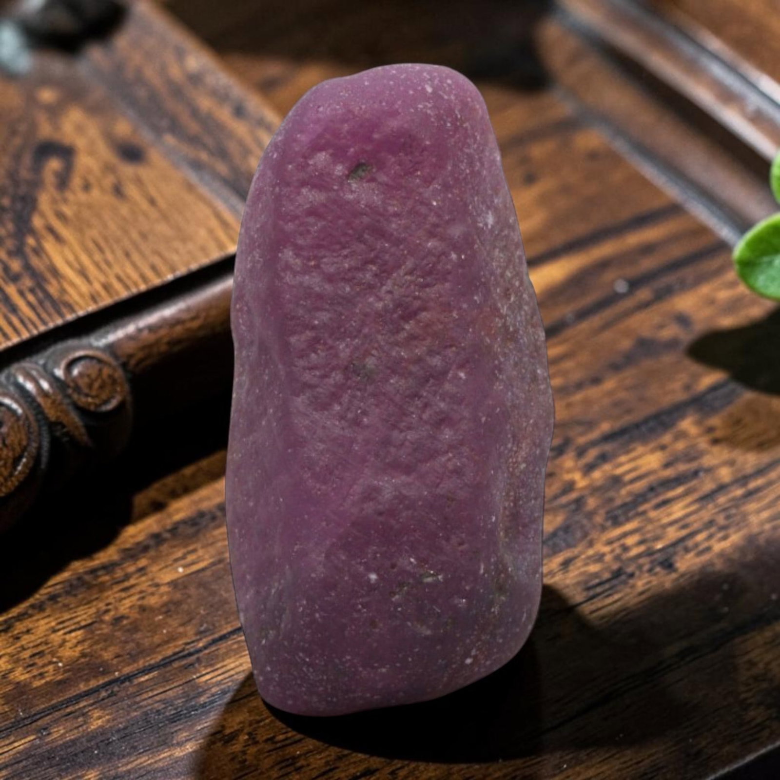 10.38ct Natural Mauritania Ruby Rough (Unheated), 74XE: This unheated Mauritania ruby rough is a captivating natural crystal specimen, featuring vivid magenta-purple ruby formations embedded in a contrasting greyish matrix. The stone's rugged, unpolished s