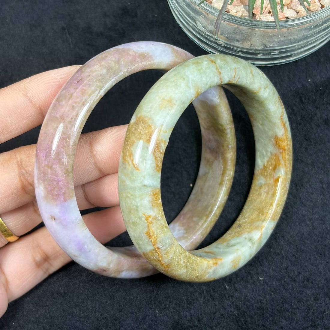 Lot of 2 Natural Burmese Type A Multi-Color Jadeite Bangles, 54.2mm & 58.8mm Inner Diameter, 28AV: Two untreated authentic Type A jadeite bangles sized 54.2mm and 58.8mm inner diameter; one features soft lavender pink clouded jade base, the other pale celadon stone draped with natural golden-brown 
