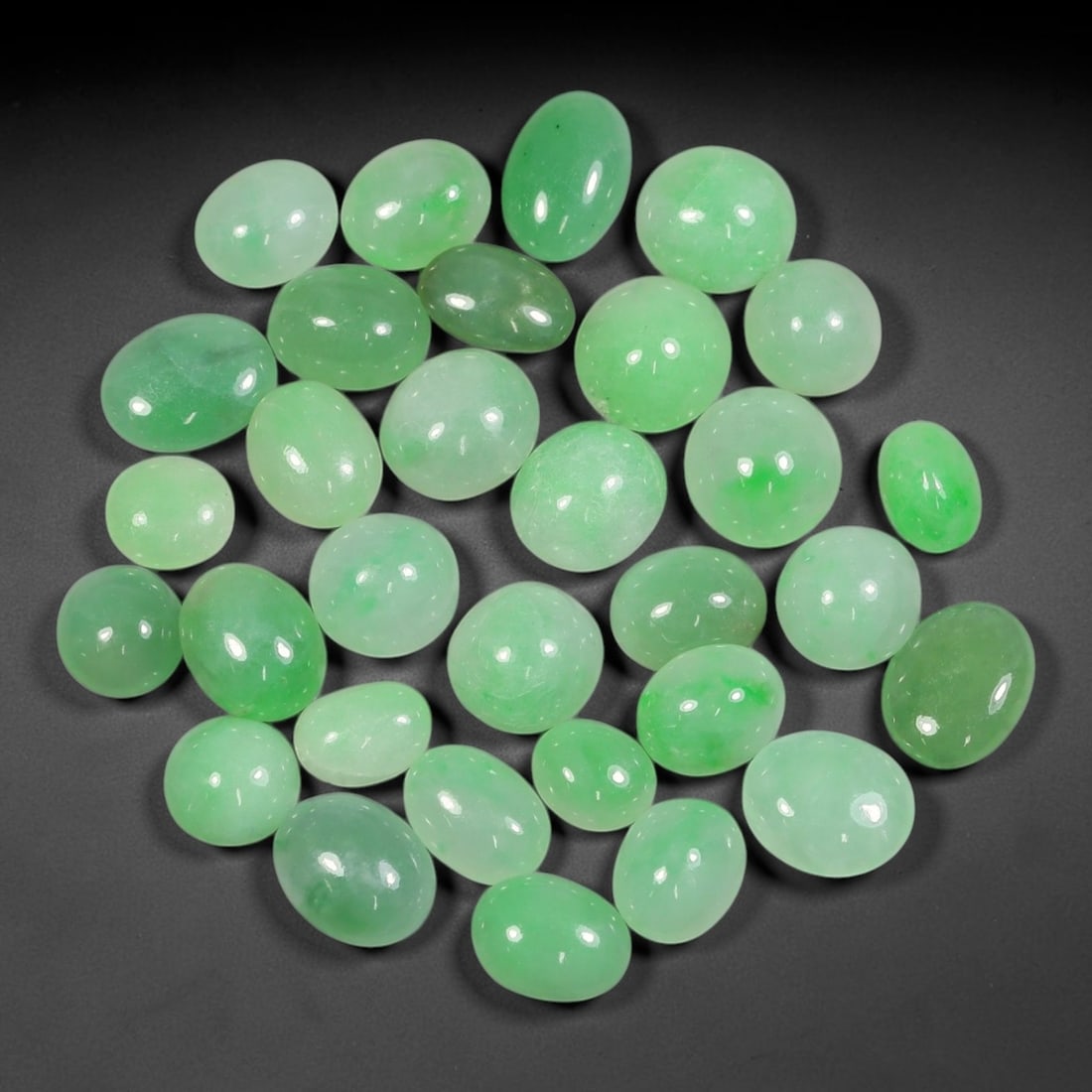 Lot of 31pcs 74.6ct Natural Burmese Type A Pastel Mint Apple Green Jadeite Jade Cabochons, 65AV: This wholesale bulk parcel holds 31 fully untreated natural Burmese Type A tiny oval jadeite jade cabochons with total combined weight 74.6ct, uniform petite dimension 10x9mm. Each stone carries a tra