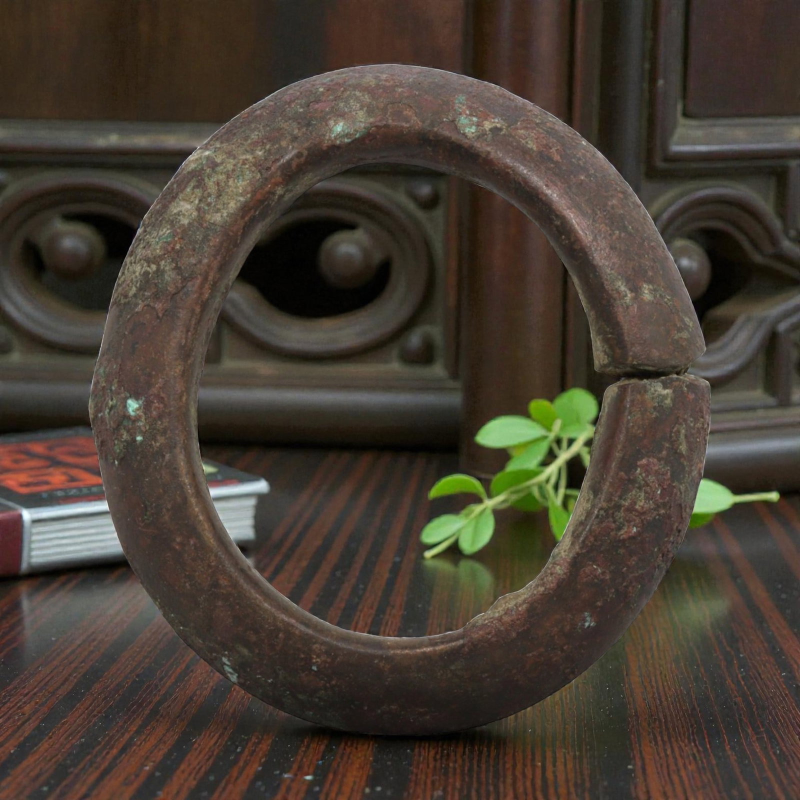 Ancient Bronze Bracelet - Roman Penannular Bangle, 27BN: A penannular bronze bracelet of ancient Roman origin, formed from a thick, robust bronze band with a rounded cross-section. The open terminals are plain and squared, characteristic of simple Roman pro