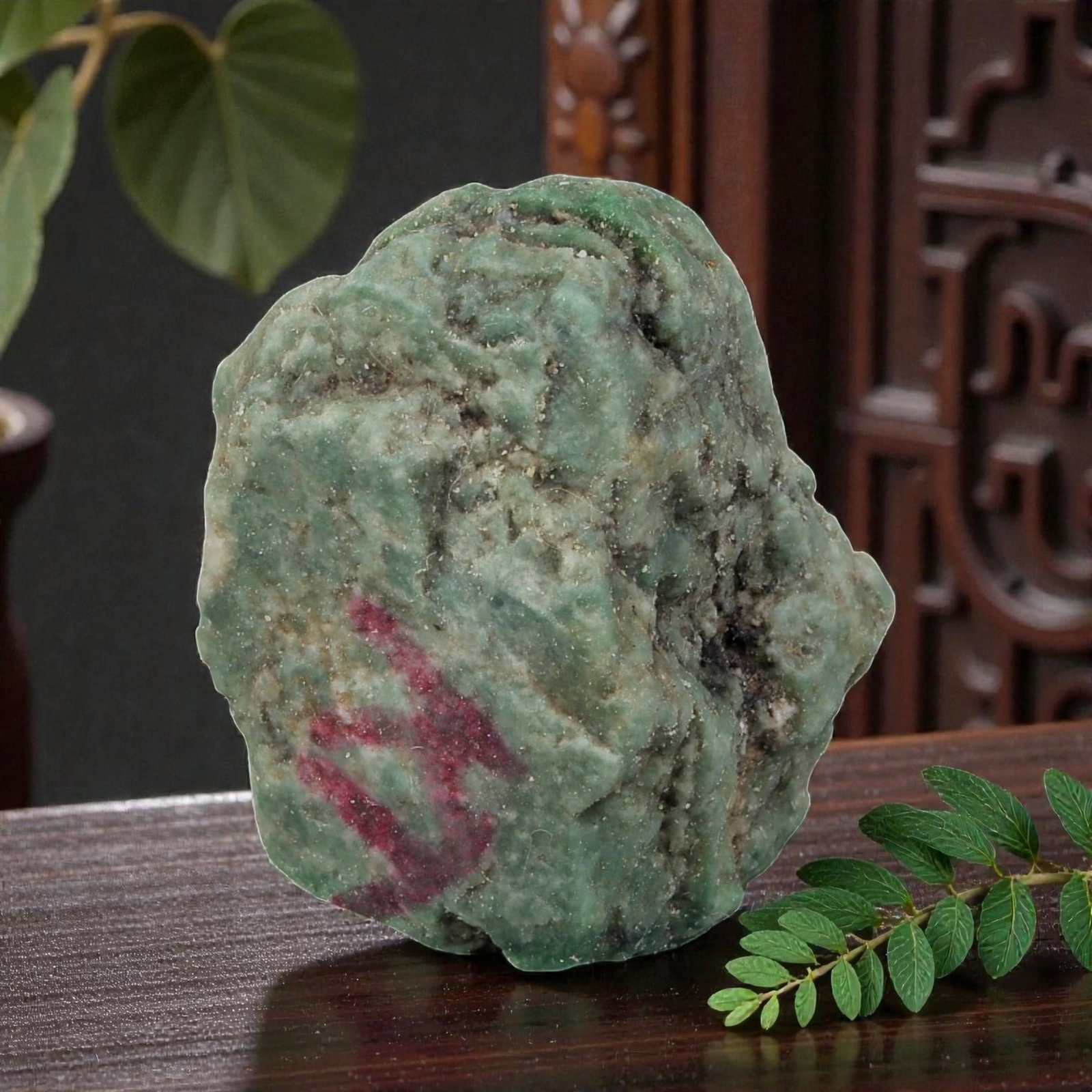 90Ct Natural Type A Burmese Jadeite Jade Rough Stone - Green Raw Material, 45EA: This is a natural, unpolished rough stone of Type A Burmese jadeite jade, weighing 90 carats and measuring 3x2.5cm. The stone displays a rich, muted green base with natural surface textures, dark mine