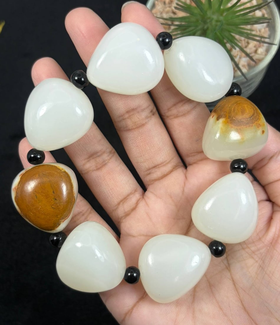 Chinese Natural White Nephrite Jade Bracelet with Raw Brown Skin Beads, Pebble Jade Beads, 14AS: Hand-strung single strand bracelet crafted from natural white nephrite jade pebble beads, each measuring 2.5cm in irregular teardrop shape. Most beads feature smooth milky white polished jade surfaces