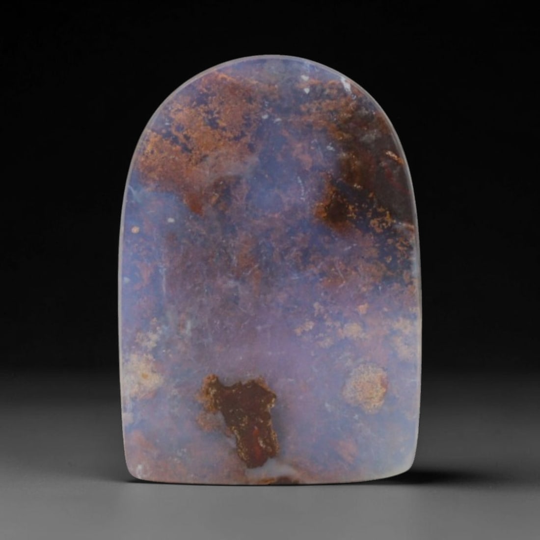 19.85 Carats Lavender Boulder Opal Cabochon - Natural Australian Stone, 15XC: This unique boulder opal cabochon, measuring 18.7 x 13.2 x 6.5 mm, presents a stunning natural composition. Polished into a sleek, arched-top shape, the stone features a soft lavender-blue opal matrix