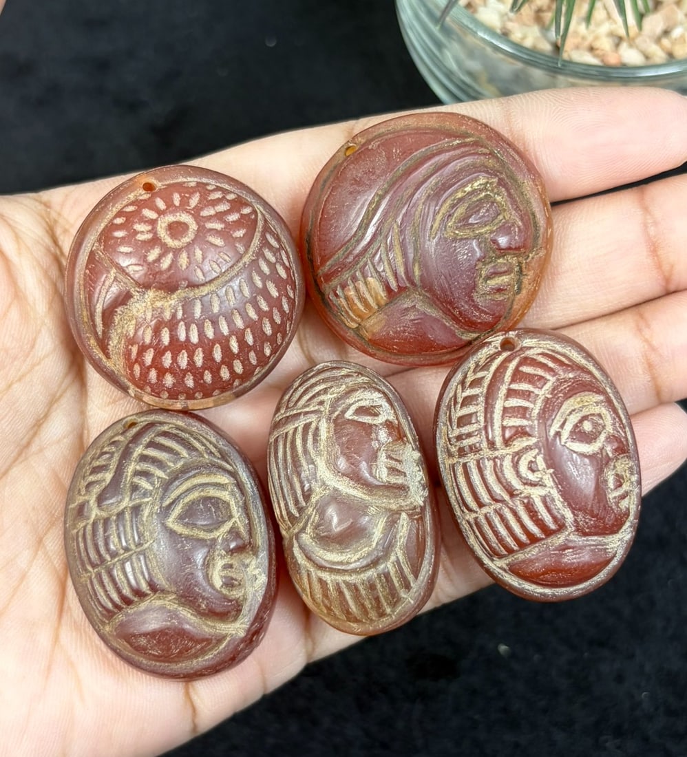Lot Of 5 Antique Egyptian Carnelian Intaglio with Profile Head Motif, 70AR: Each oval tablet is hand-carved from natural carnelian stone, featuring incised profile human head iconography with stylized patterned hair, defined facial detailing, and classical Egyptian facial pro