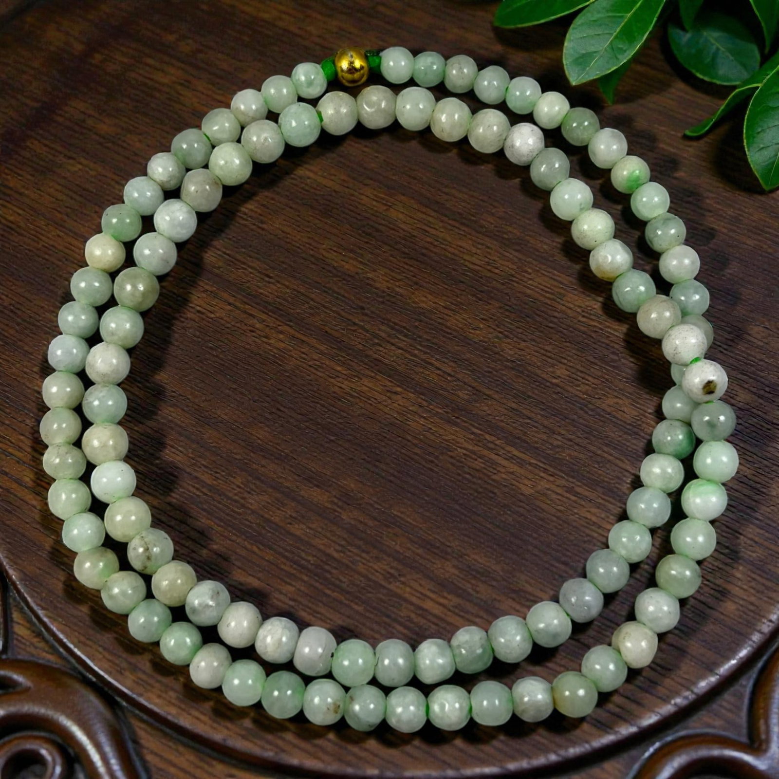 Natural Burmese Pale Green Type A Jadeite Jade Bead Necklace, 31YG: A continuous strand of evenly spherical polished Type A jadeite beads blending soft pale mint green and milky white natural hues, with subtle internal mineral inclusions and gentle tonal variations th
