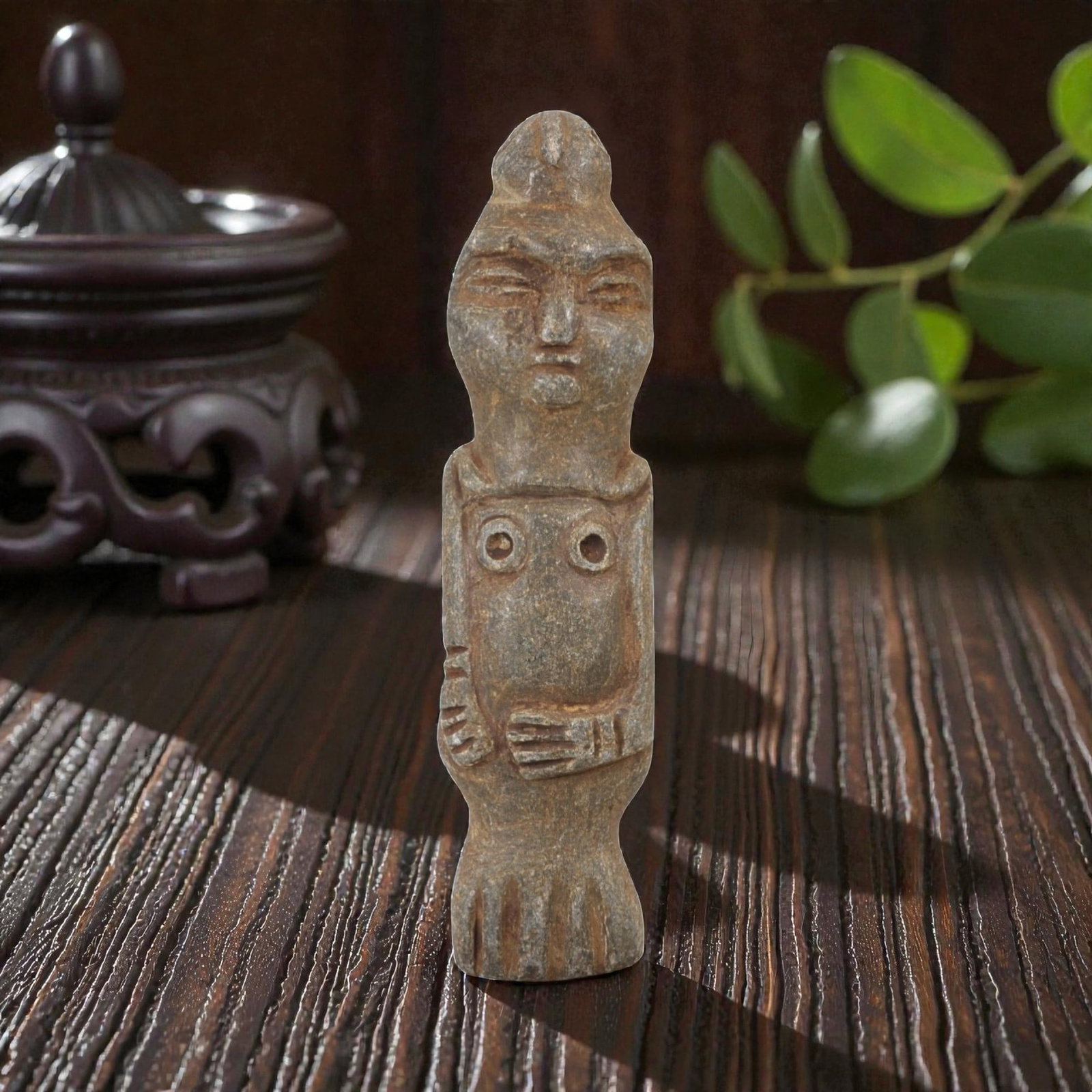 Ancient Stone Idol - Anthropomorphic Votive Figurine, 54AM: This tall, slender stone idol is carved from a coarse-grained, micaceous stone with a heavily weathered, earthy patina ranging from gray to warm brown. The form depicts a stylized standing human figur
