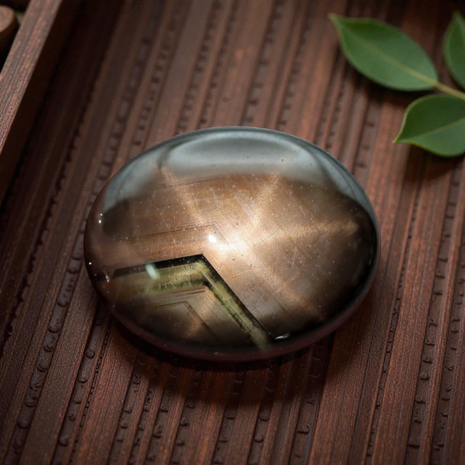 6.18 Carats Bronze-Black Star Sapphire Oval Cabochon - Natural Loose Gemstone, 3XC: This striking black star sapphire presents a unique metallic bronze sheen, with a warm coppery glow that shifts across its smooth, polished cabochon surface. A crisp six-rayed star cuts vividly throug
