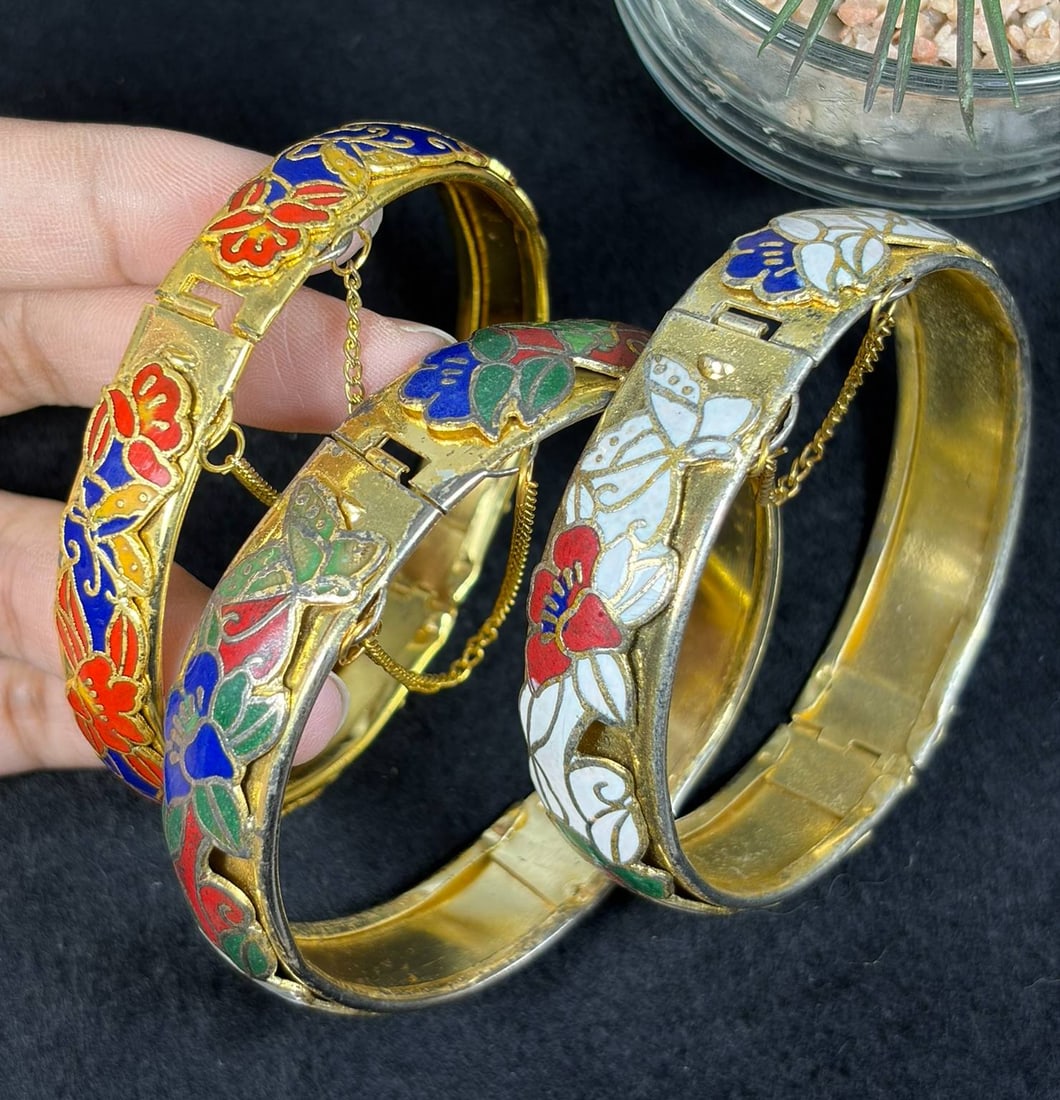 Lot of 3 Vintage Gold Tone Floral Butterfly Cloisonne Hinged Bangle Bracelets, 21EB: Set of 3 vintage gold base cloisonne hinged bangles decorated with colorful enamel floral and butterfly filigree patterns, each fitted with a safety chain and openable hinge that fits most wrist sizes