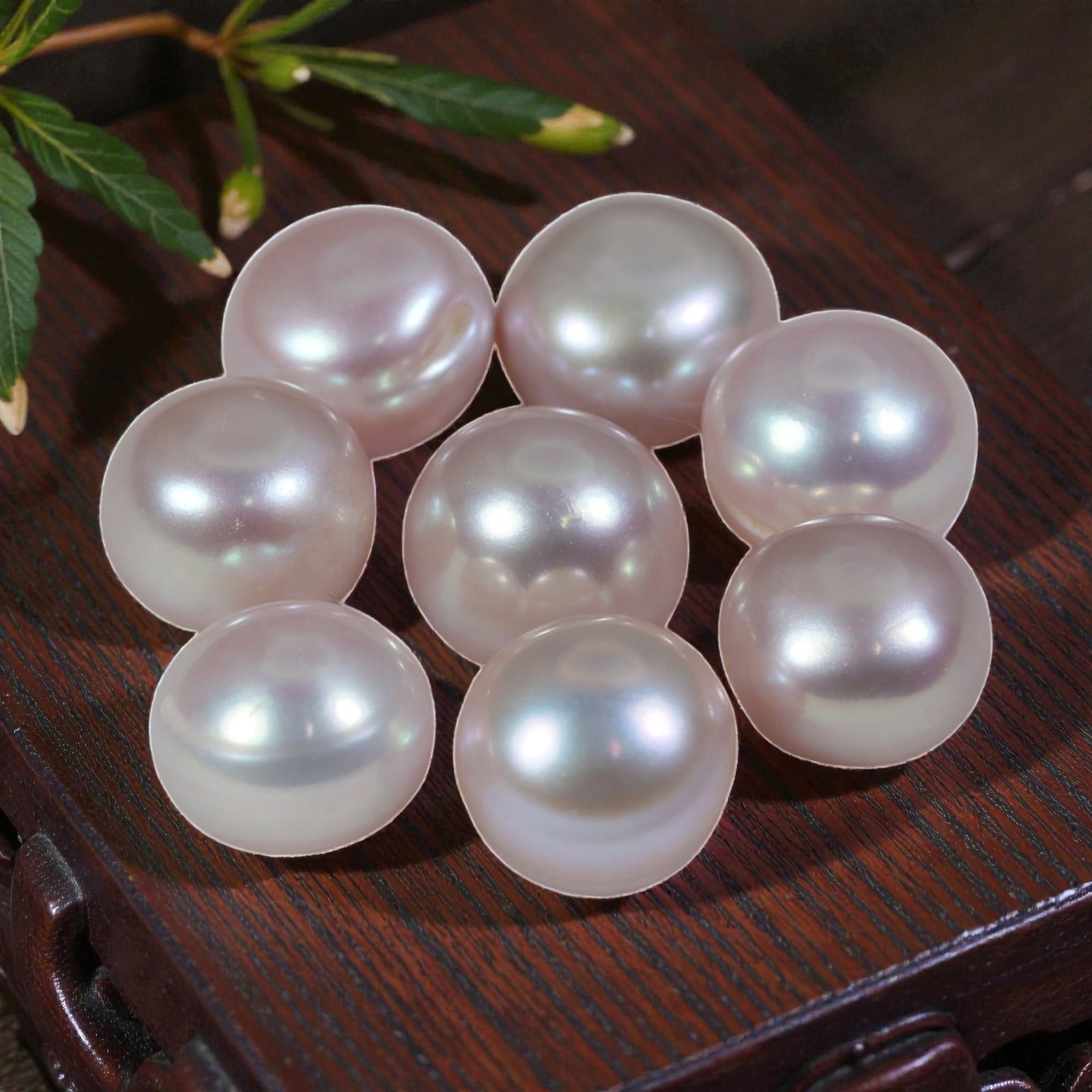 20.37ct Natural Fresh Water Pearl Drilled, 28YH: This is a drilled, natural freshwater pearl, showcasing a soft, silvery-pink hue with a smooth, polished surface and a luminous, iridescent luster. The pearl features a near-round shape with consisten