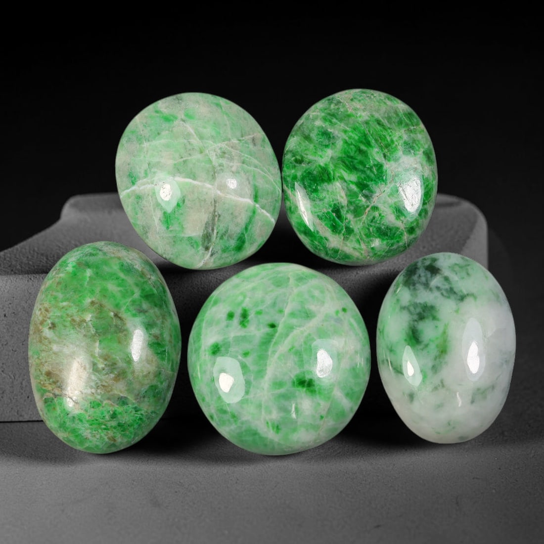 Lot of 5pcs 92ct Natural Burmese Type A Web Veined Speckled Emerald Ice Jadeite Jade Cabochons, 48AV: This wholesale bulk set contains 5 fully untreated natural Burmese Type A jadeite jade oval cabochons with a total combined weight of 92ct, the largest measuring 24x17mm. Each cabochon features a tran