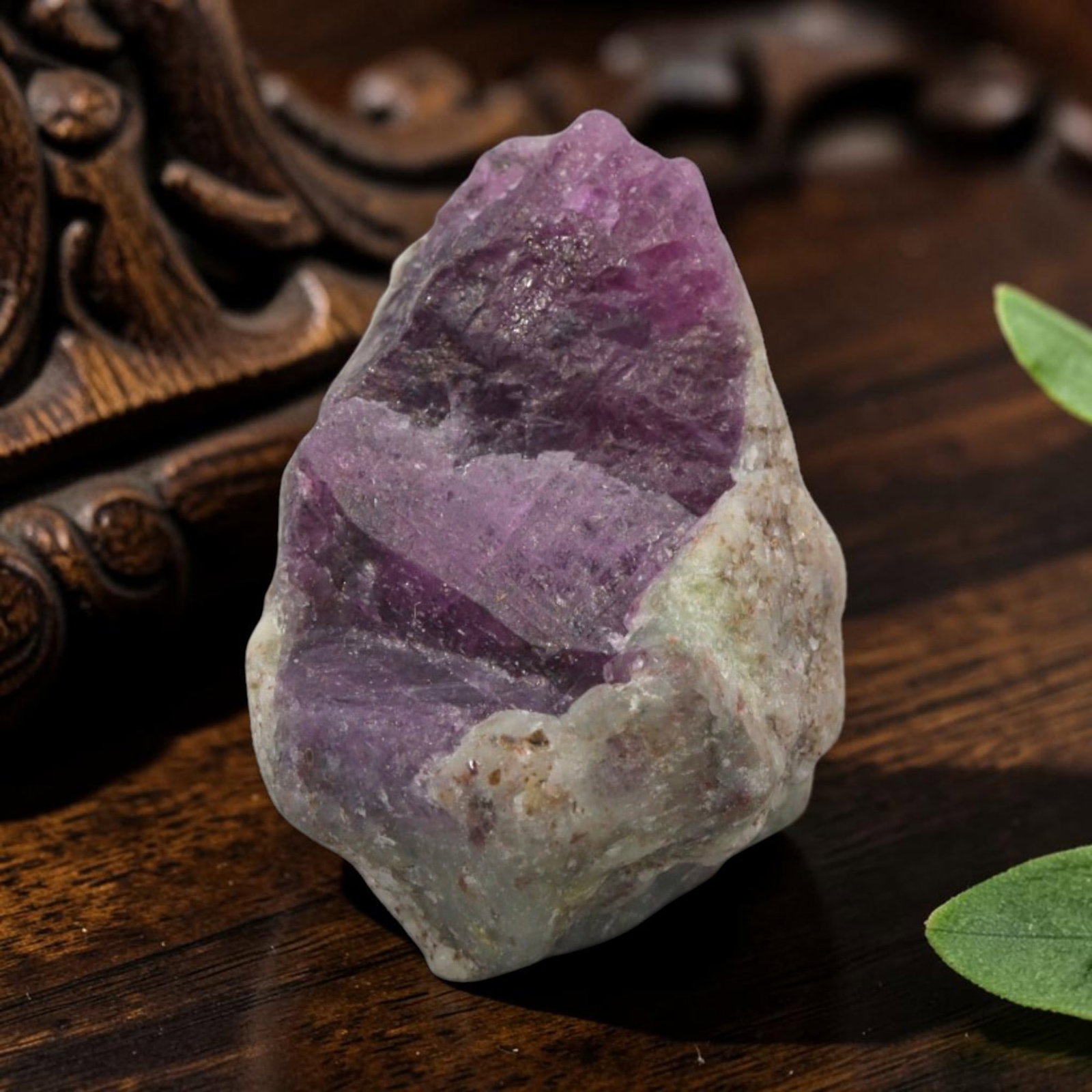 18.55ct Natural Mauritania Ruby Rough (Unheated), 76XE: This unheated Mauritania ruby rough is a captivating natural crystal specimen, featuring vivid magenta-purple ruby formations embedded in a contrasting greyish matrix. The stone's rugged, unpolished s