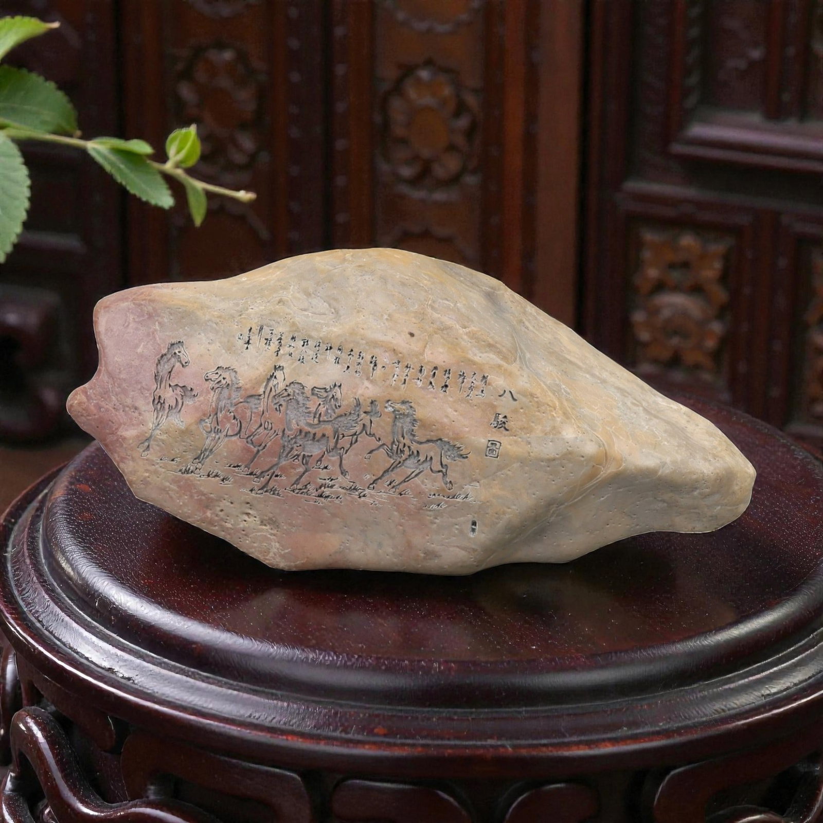 A Chinese Carved Stone Scholar's Object, 20th Century, 33FH: Carved from a naturally shaped stone with variegated beige, buff, and light russet tones, the object is worked as a horizontal display piece intended for desk or shelf presentation. One principal face