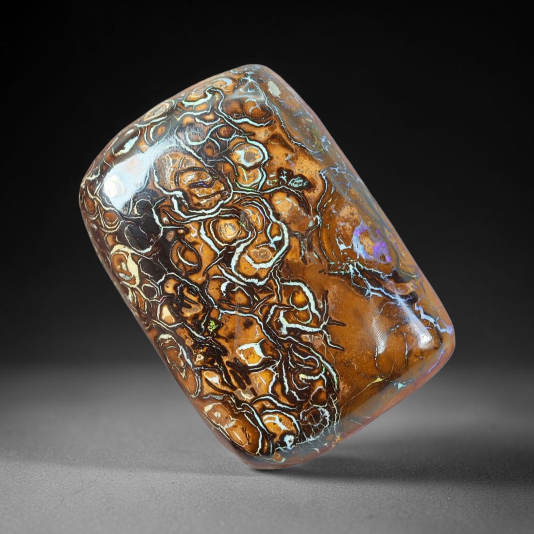 33.35ct Natural Australian Queensland Matrix Boulder Opal Cabochon, 71AT: Hand polished freeform rectangular cushion cabochon mined from Queensland matrix boulder opal, featuring warm caramel ironstone host matrix interwoven with distinctive concentric circular opal banding