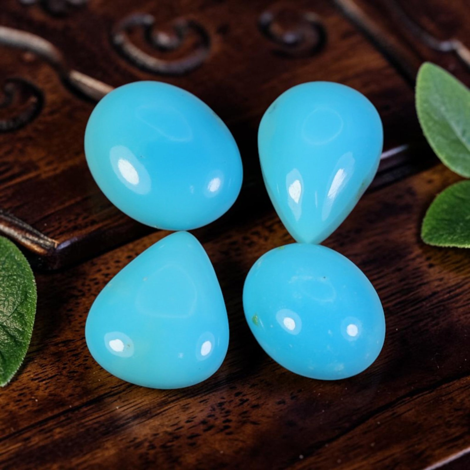 5.28 Carats Natural Arizona Sleeping Beauty Turquoise Teardrop Cabochon Parcel, 91WC: This small parcel contains polished teardrop-shaped cabochons of authentic Arizona Sleeping Beauty turquoise, displaying a smooth, vivid uniform sky-blue tone iconic to this famous turquoise mine. Eac