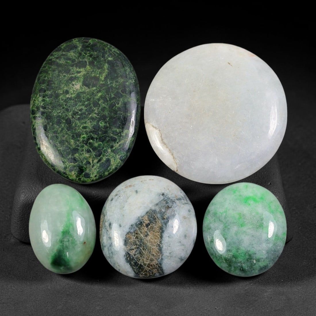 5pcs 149ct Natural Burmese Type A Landscape Ice Green Web Vein Jadeite Jade Cabochons, 82AV: This wholesale gem parcel contains 5 fully untreated natural Burmese Type A jadeite jade cabochons in mixed oval and round silhouettes, total combined weight 149ct with the largest measuring 33x24mm. 