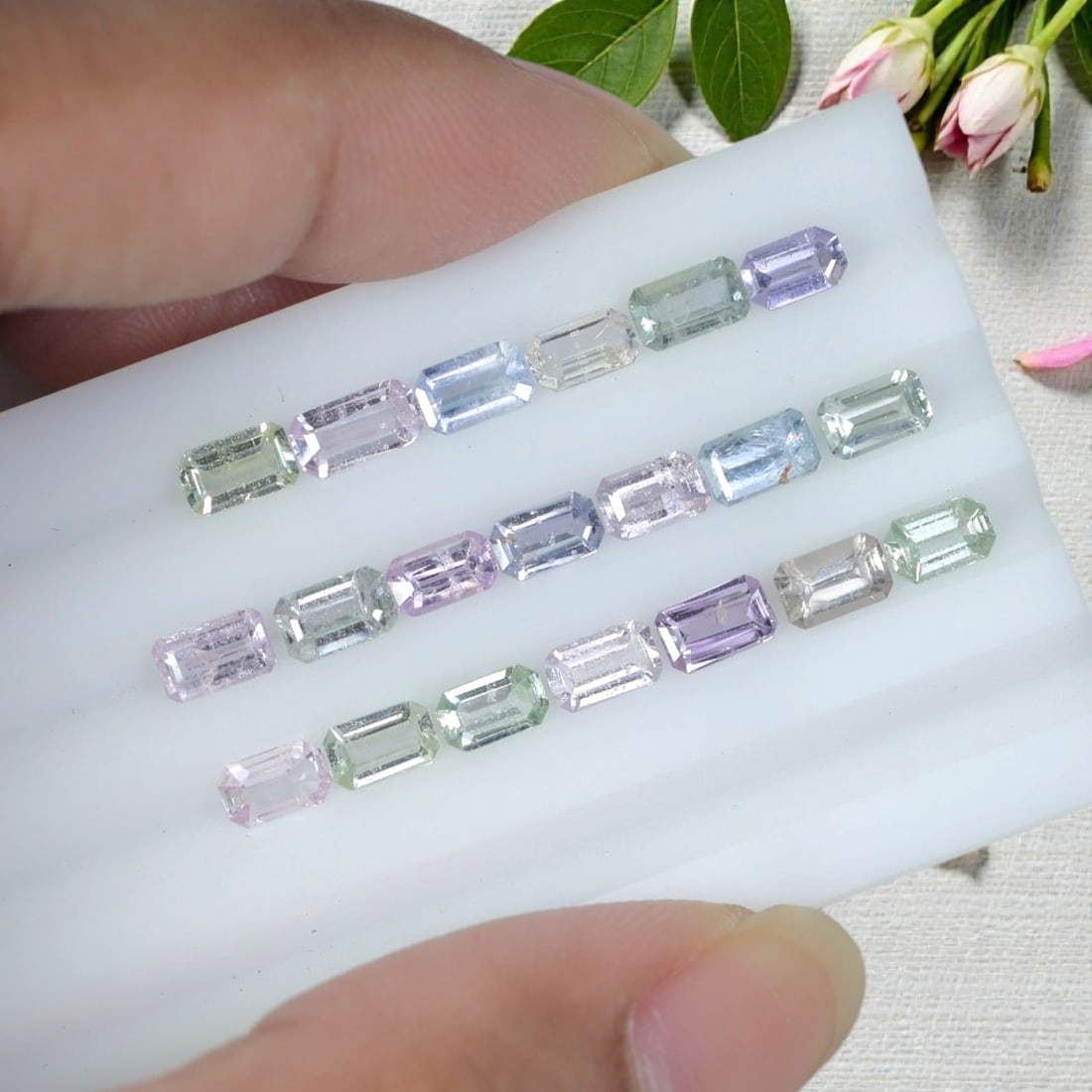 5.85 Carats Natural Pastel Multicolor Emerald Cut Sapphire Parcel - Heated Loose Gems, 16YH: This neatly assembled sapphire parcel features uniform emerald step cuts displaying a soft pastel palette including pale lavender, blush pink, sky blue, mint green, and near-colorless transparent tone