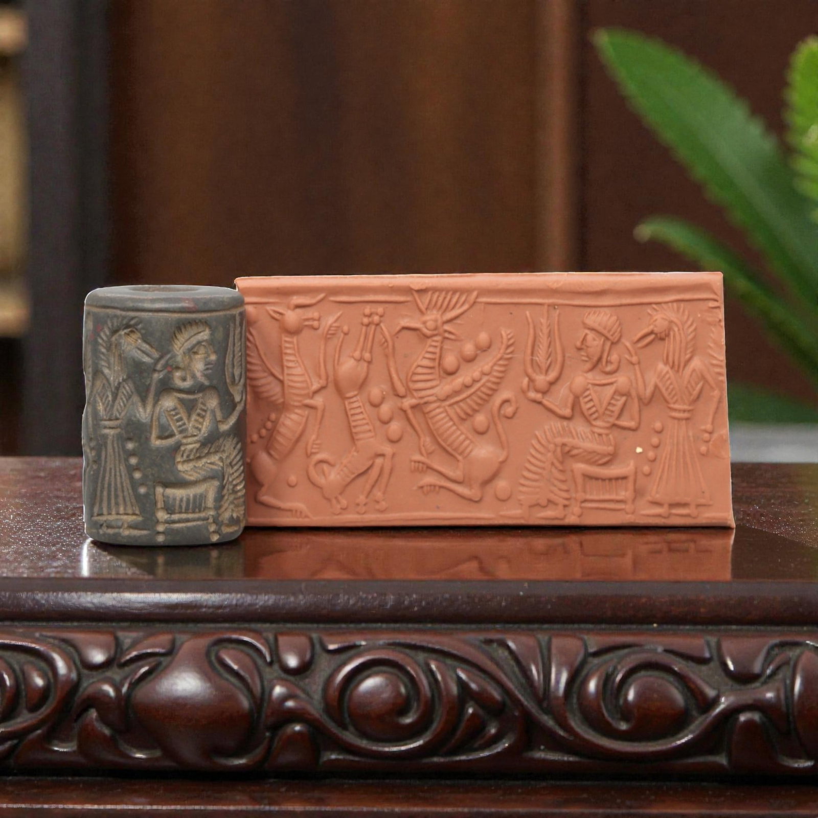 Ancient Steatite Cylinder Seal - Mesopotamian Mythological Procession & Deity Scene, 6ZP: Carved from dark, finely grained steatite, this ancient Mesopotamian cylinder seal depicts a rich mythological procession scene, executed with meticulous glyptic craftsmanship characteristic of the La