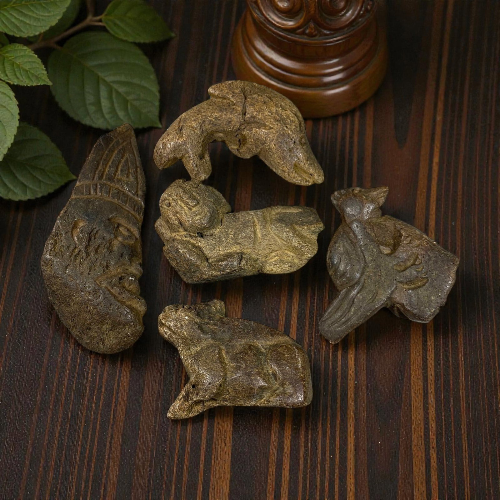 Lot of 5 Medieval Tribal Stone Carvings, Mediterranean Region, 79AG: A collection of five hand-carved stone figurines attributed to medieval tribal cultures of the Mediterranean region. Crafted from dark, weathered stone with a rich earthy patina, the carvings show cle