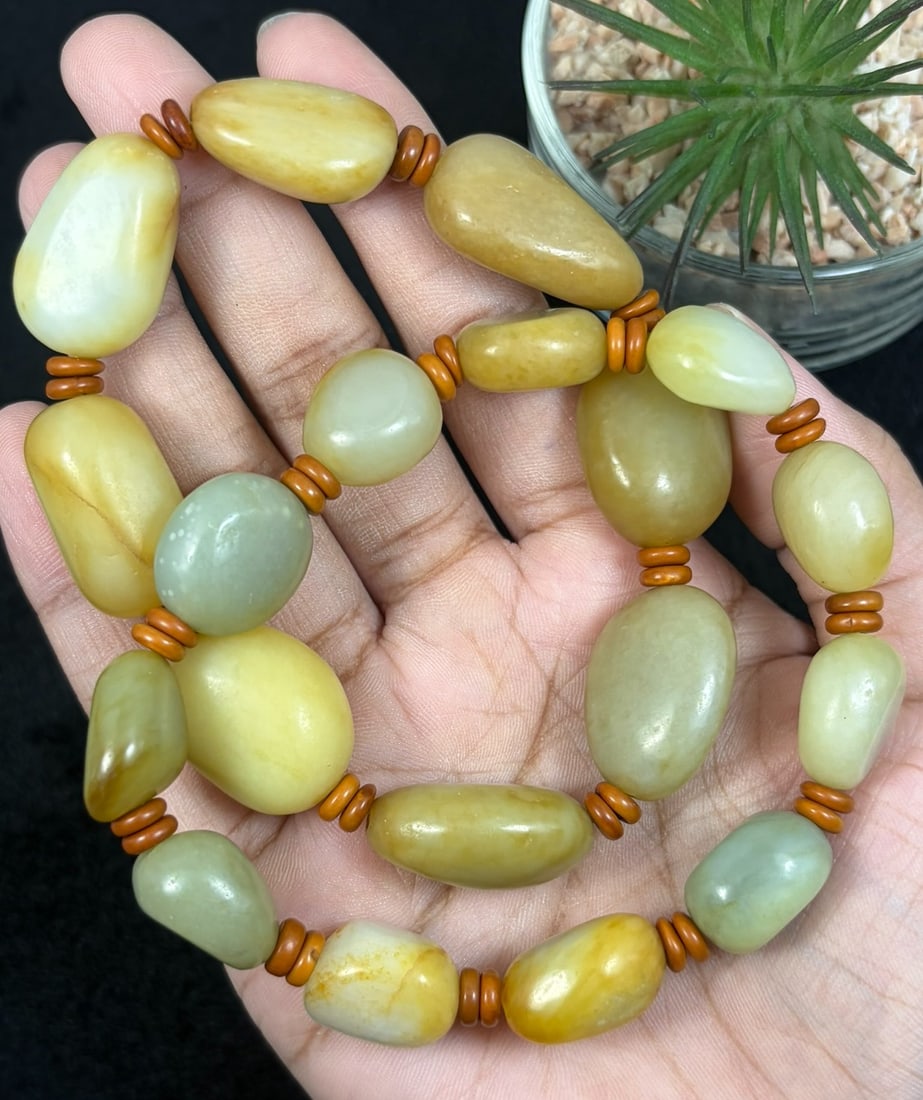 2 Strands Natural Hetian Seed Nephrite Jade Pebble Beaded Bracelets, 55YJ: Set of two matching stretch bracelets made of natural Hetian seed nephrite jade raw pebble beads measuring 13.9mm, separated by small wooden spacer discs; each bead retains natural organic irregular s