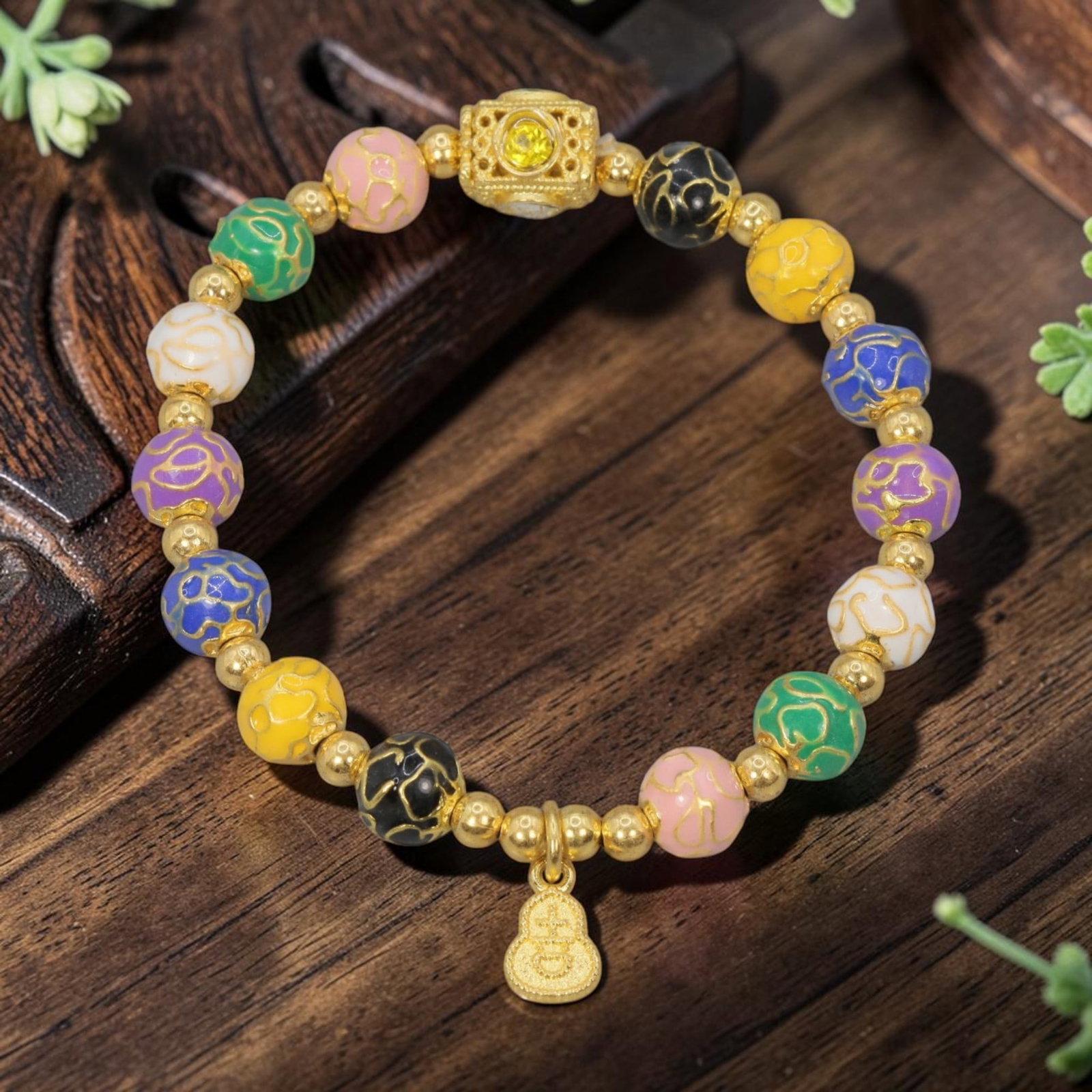 A Chinese Cloisonne Enamel Beaded Bracelet - Multicolor Gold-Tone Gourd Charm, 37YJ: This modern Chinese-style bracelet features 9.40mm round cloisonne enamel beads in a vibrant mix of hues, each detailed with raised gold-tone cloud patterns. Small smooth gold-tone spacer beads separa