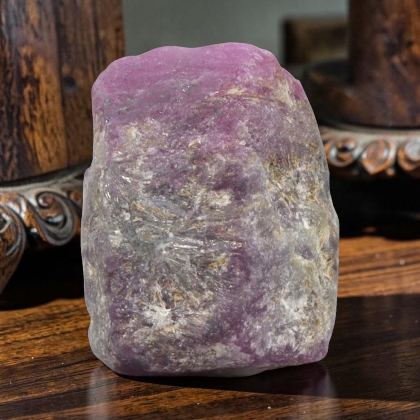 24.15ct Natural Mauritania Ruby Rough (Unheated), 56XE: This unheated Mauritania ruby rough is a captivating natural crystal specimen, featuring vivid magenta-purple ruby formations embedded in a contrasting greyish matrix. The stone's rugged, unpolished s