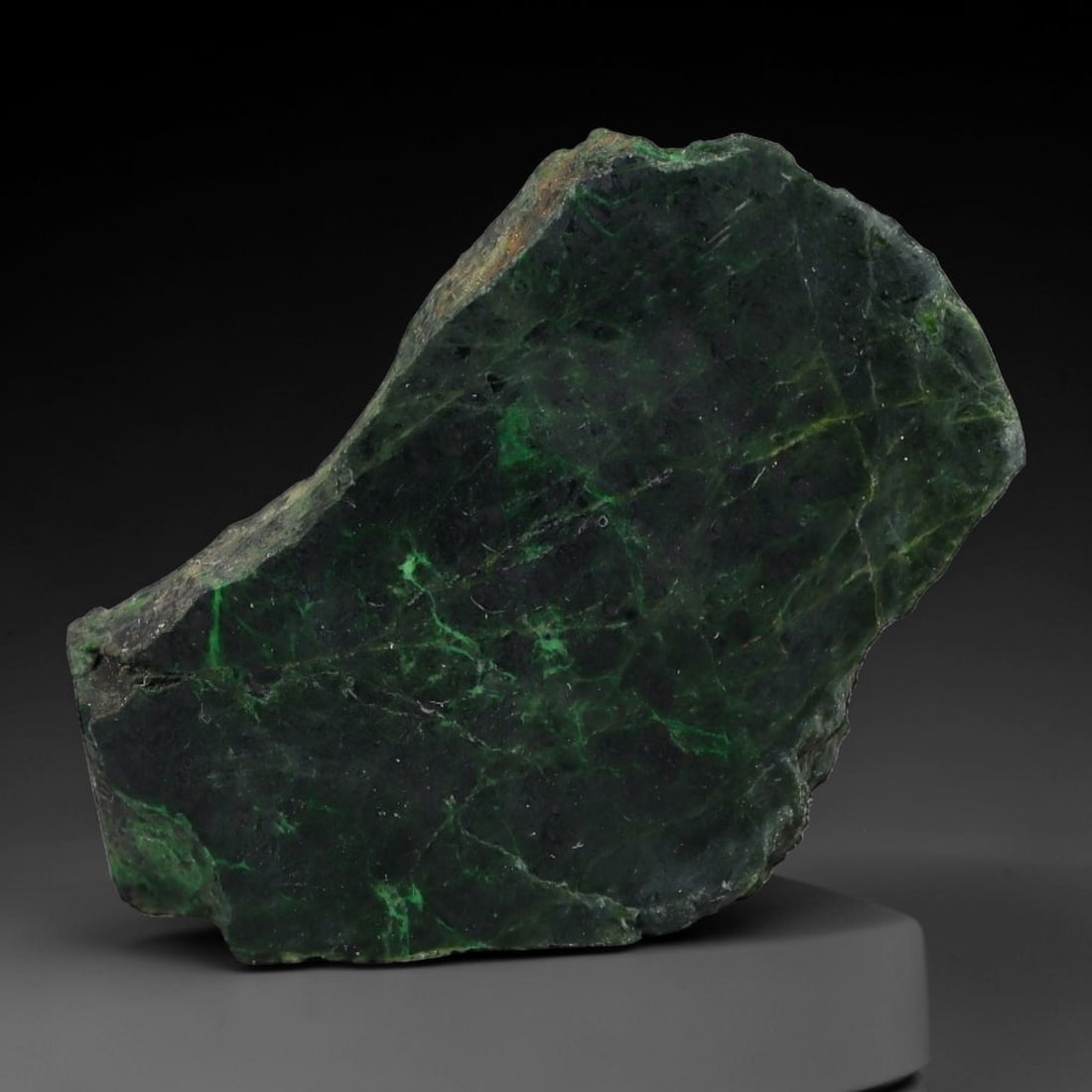 120ct Natural Type A Burmese Jadeite Jade Sliced Rough, 27AZ: This specimen is a sliced rough block of natural Type A Burmese jadeite jade. The interior displays natural colour zoning with visible mineral veining and crystalline patterns typical of unprocessed j