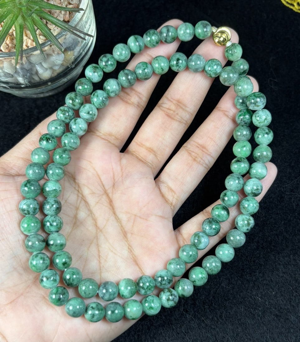 Natural Burmese Type A Grass Green Speckled Jadeite Beaded Necklace, 28YM: Hand-strung natural Burmese Type A jadeite round beads covered with fine scattered grass-green speckles across a pale translucent base, forming classic moss-in-snow texture. Every bead is evenly shape