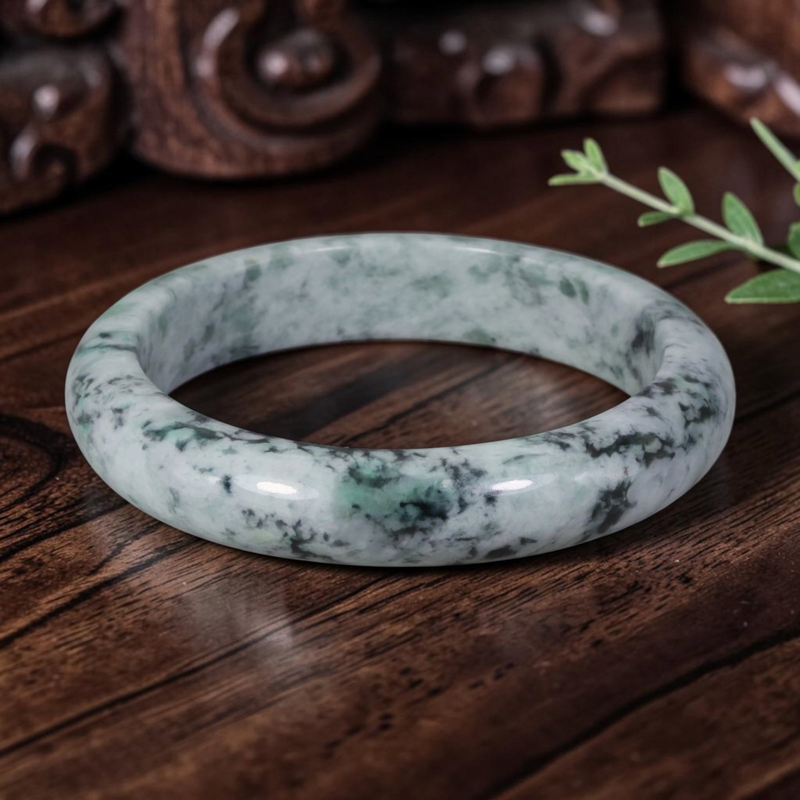 Natural Burmese Type A Green & Black Jadeite Jade Bangle Bracelet, 66AZ: Crafted from natural Burmese Type A jadeite jade, this bangle is covered with dense dark green and black mottling spread evenly over a pale milky white base, forming a rich Moss in Snow pattern. The s