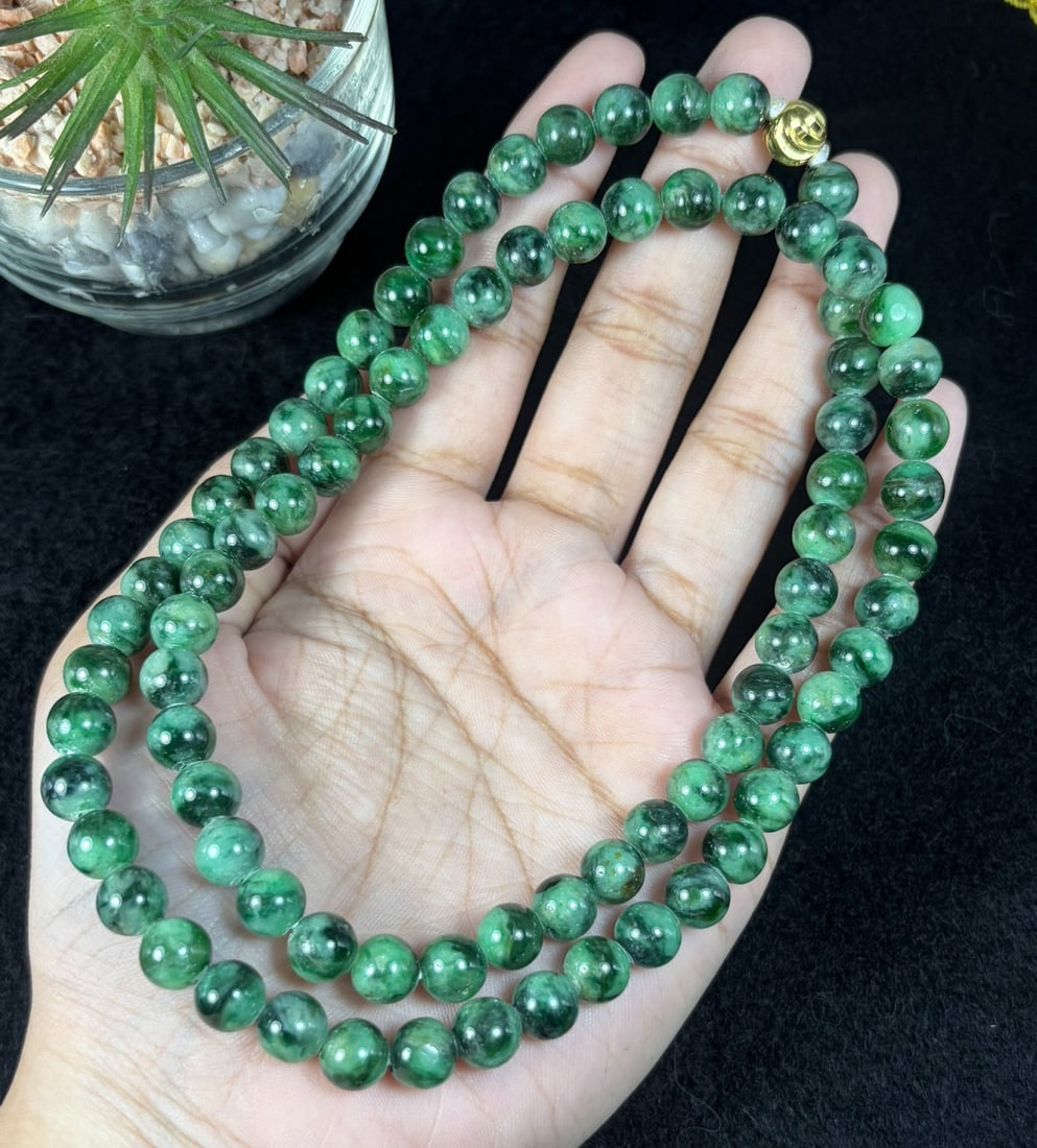 Natural Burmese Type A Dark Floating Green Jadeite Beaded Necklace, 22YM: Hand-strung natural Burmese Type A jadeite round beads with rich deep green mossy floating inclusions throughout each polished bead. Every sphere features natural marbled green veining against a pale 