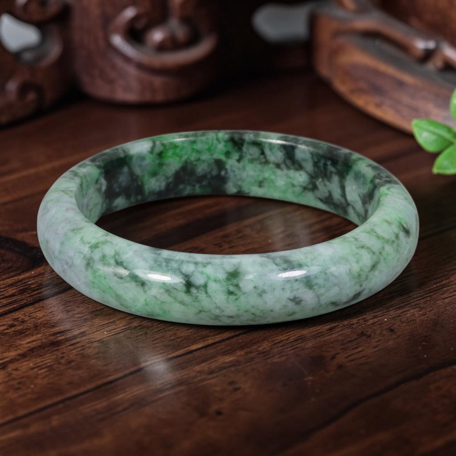 Natural Burmese Type A Dense Floating Green Jadeite Jade Bangle Bracelet, 6YM: Crafted from natural Burmese Type A jadeite jade, this bangle features densely clustered deep green and dark mottling spread over a pale white base, creating a lush rich Moss in Snow pattern. The jade