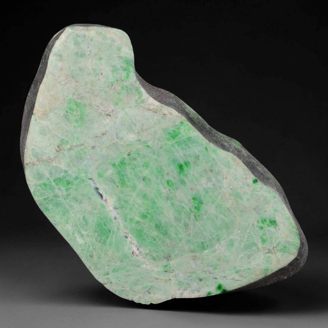 410ct Natural Type A Burmese Jadeite Jade Sliced Rough, 48AZ: This specimen is a sliced rough block of natural Type A Burmese jadeite jade. The interior displays natural colour zoning with visible mineral veining and crystalline patterns typical of unprocessed j
